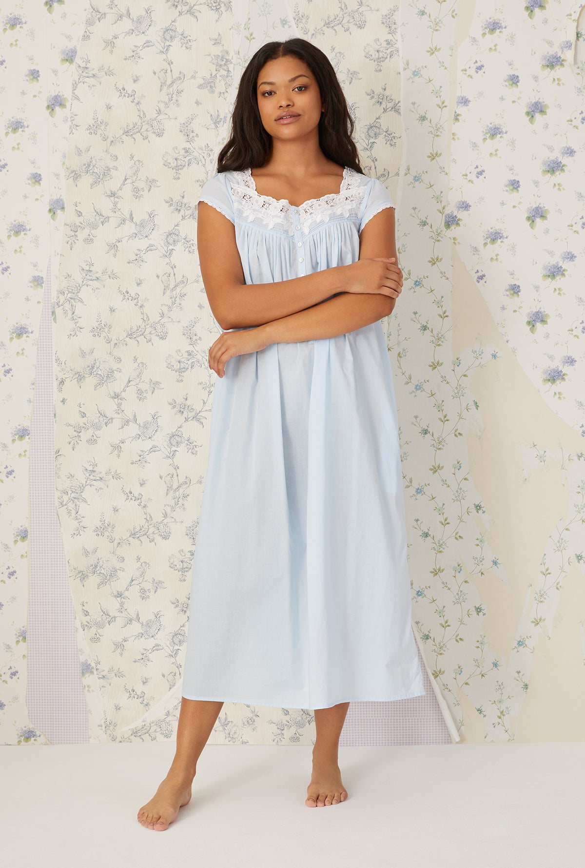 A lady wearing plus size light blue Florentine Lace Cap Sleeve Gown in a  front view pose
