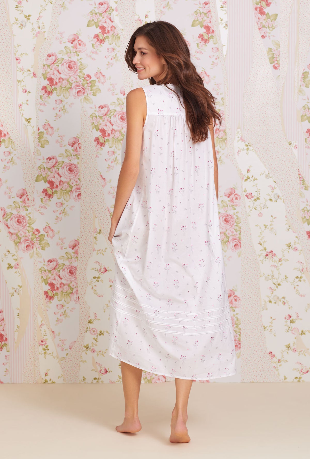 A lady wearing white sleeveless Cotton Lawn Nightgown with Dream Bouquet  print