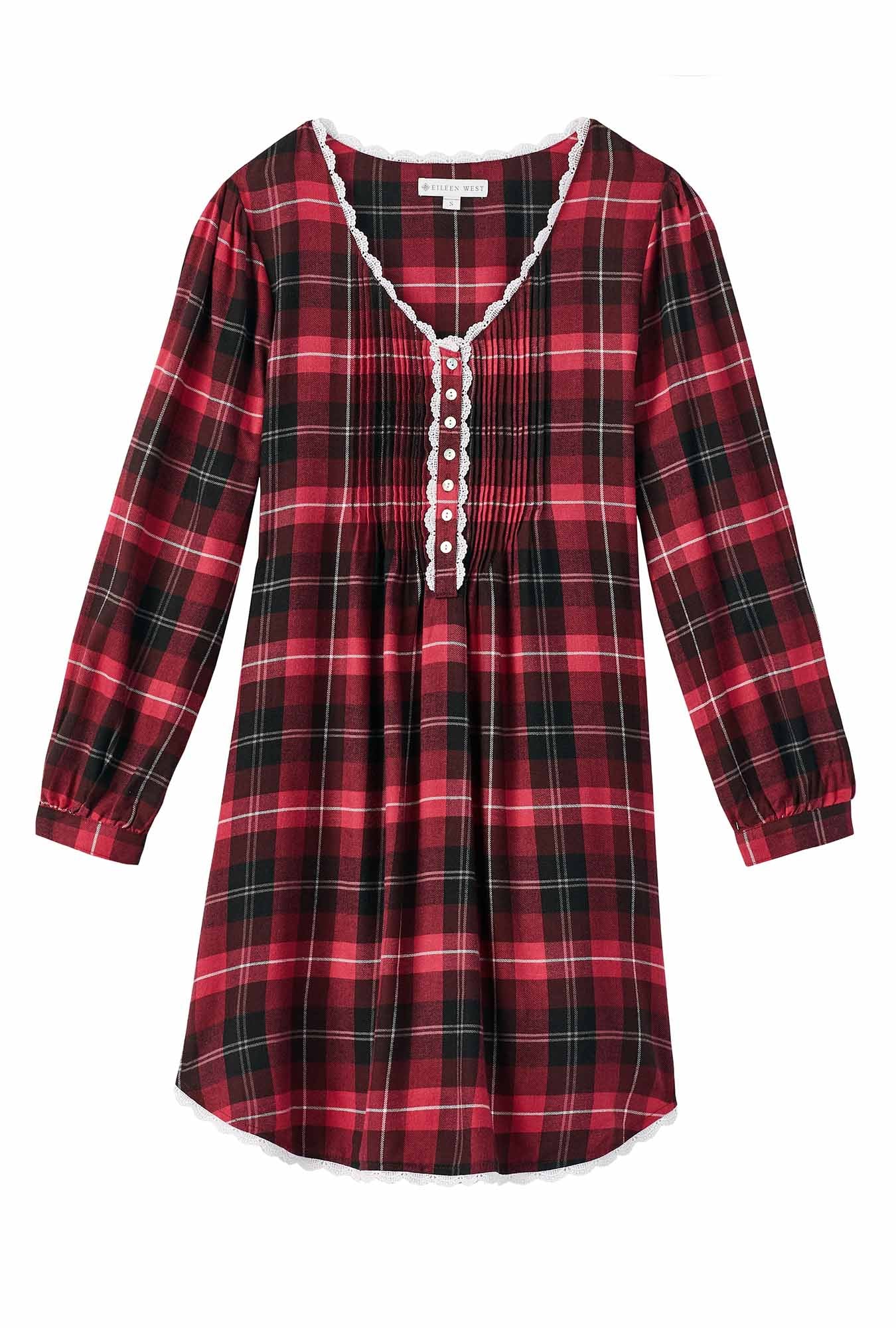 A lady wearing a holly berry plaid rayon long sleeve lightweight flannel nightshirt.