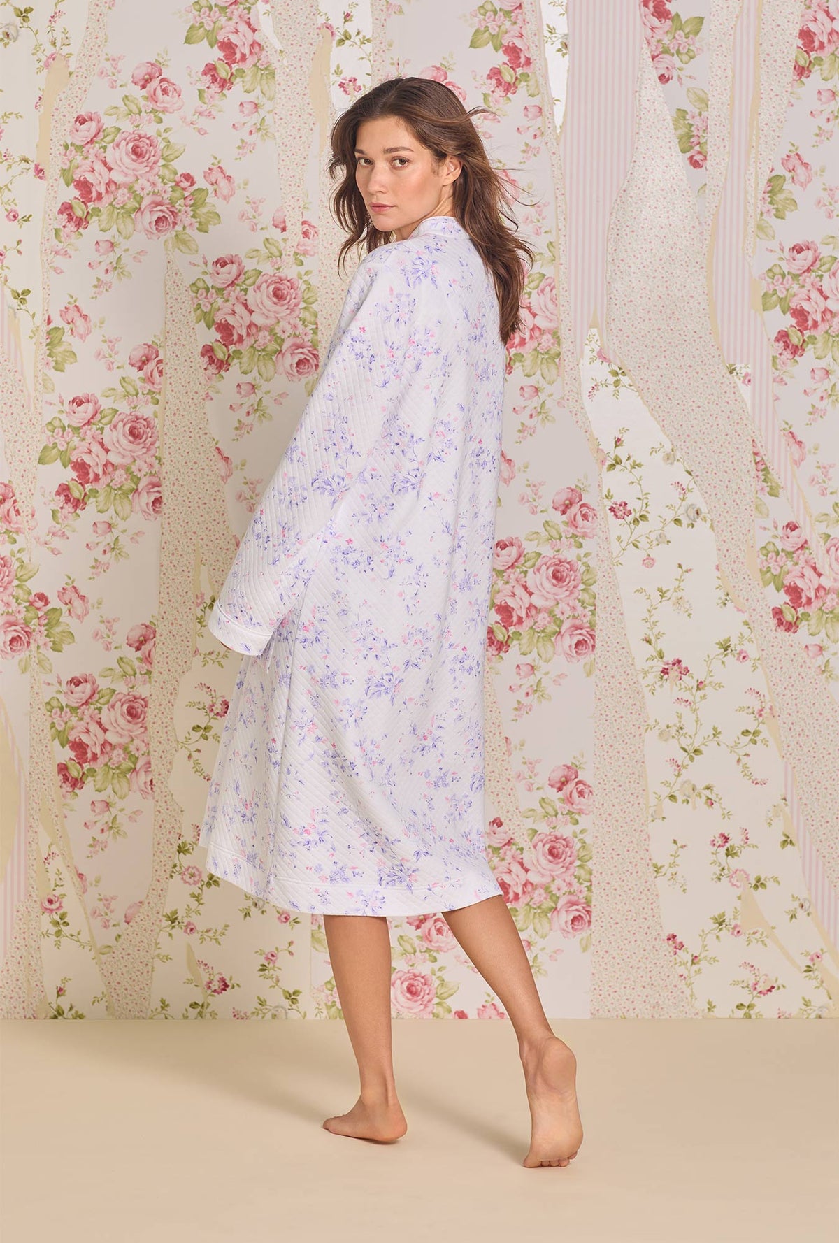 A lady wearing Petite Floral Diamond Quilt Zip Robe