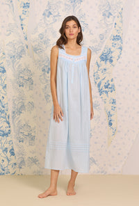 A lady wearing Dobby Stripe Blue Gown