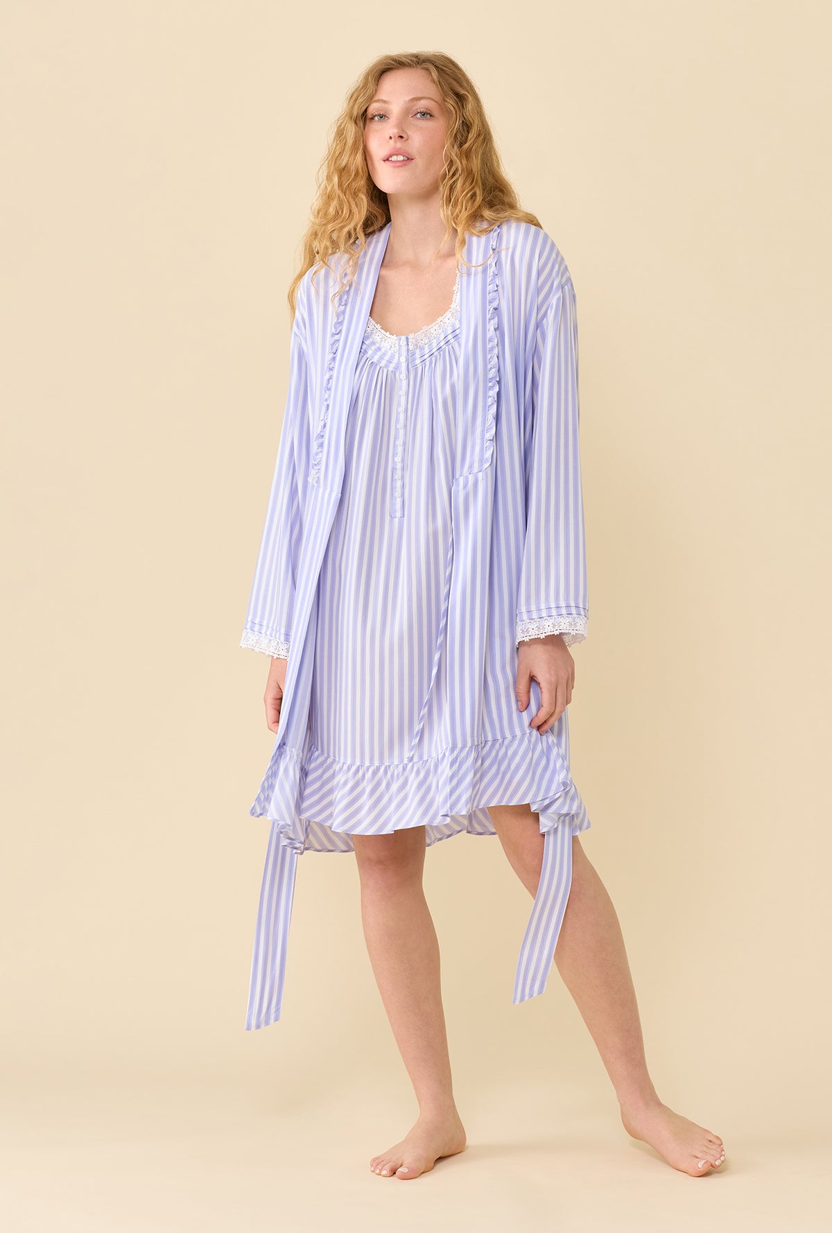 A Lady Wearing Provence Stripe Chemise in a front facing stepping pose with a relaxed natural stance