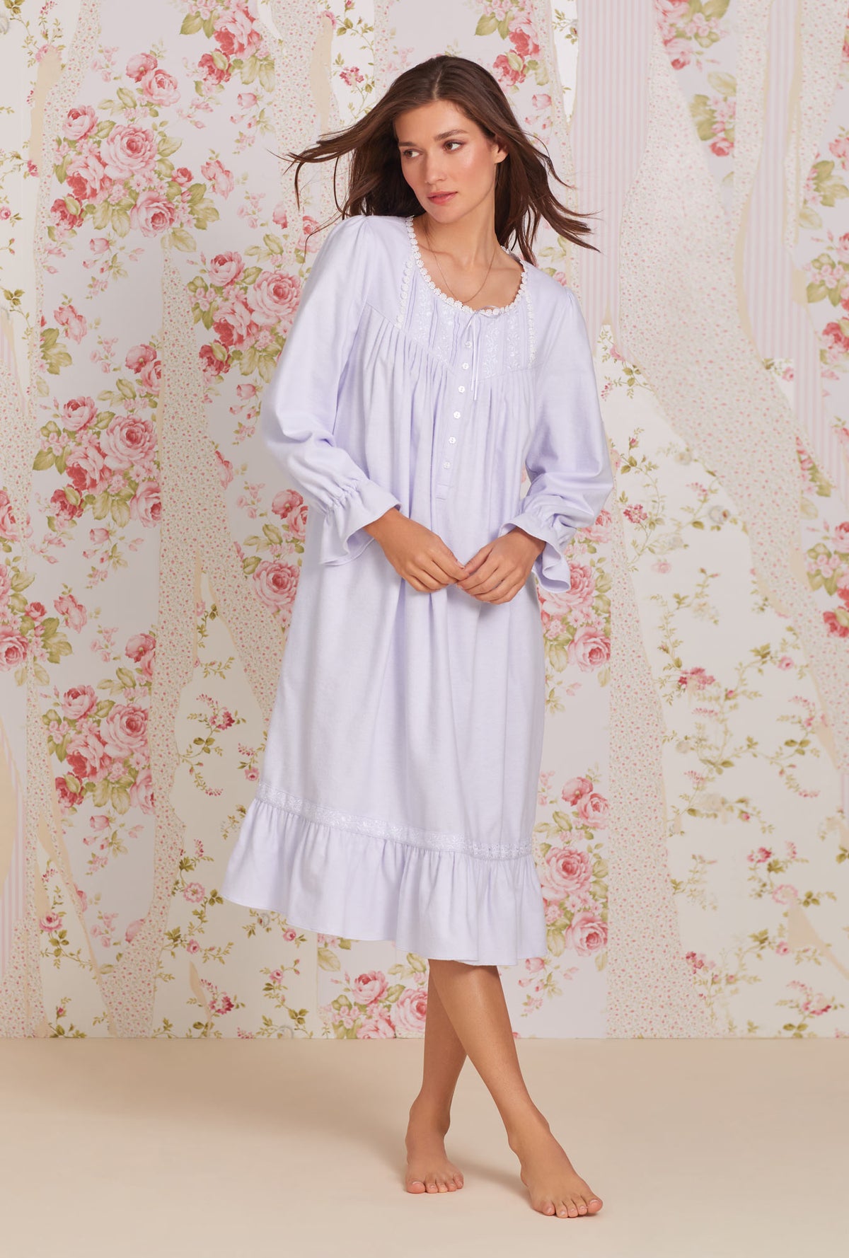 A lady wearing peri long sleeve heritage cotton flannel embroidery waltz nightgown