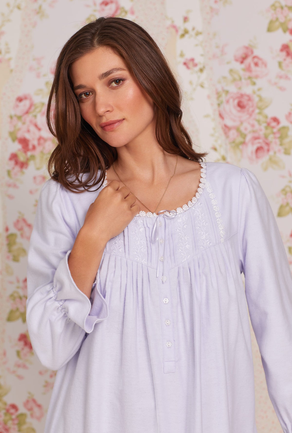 A lady wearing peri long sleeve heritage cotton flannel embroidery waltz nightgown