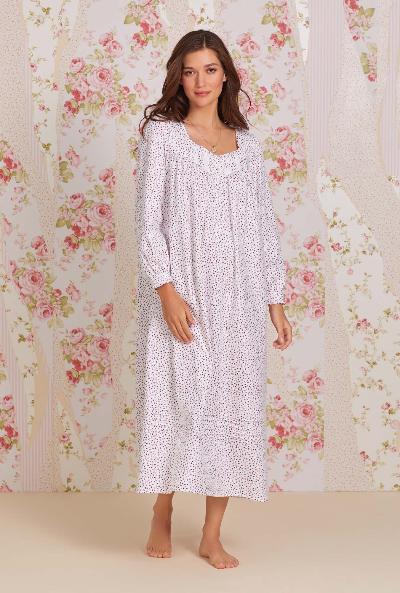 A lady wearing white long sleeve cotton flannel long nightgown with joyful berry print.