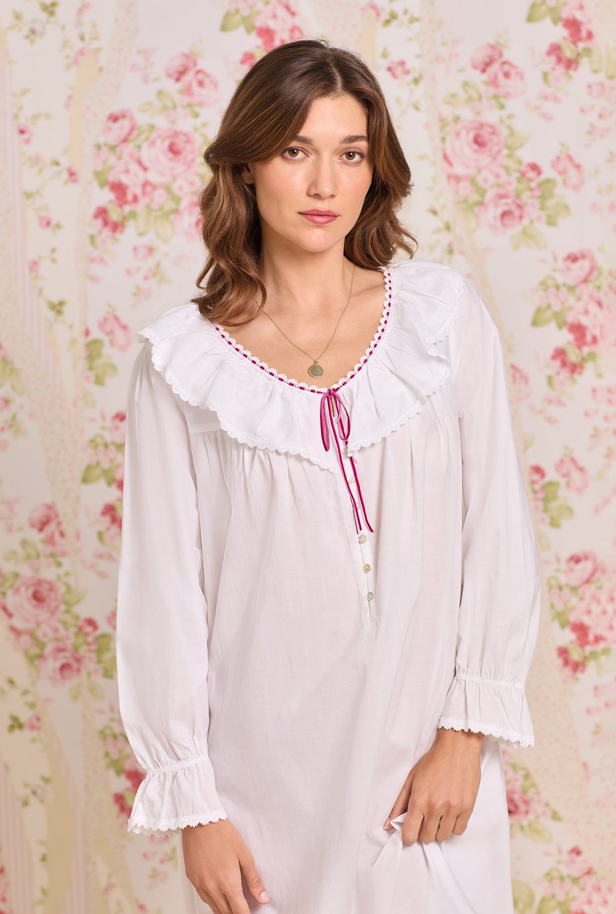 A lady wearing The "Clara" Iconic White Cotton Lawn Nightdress