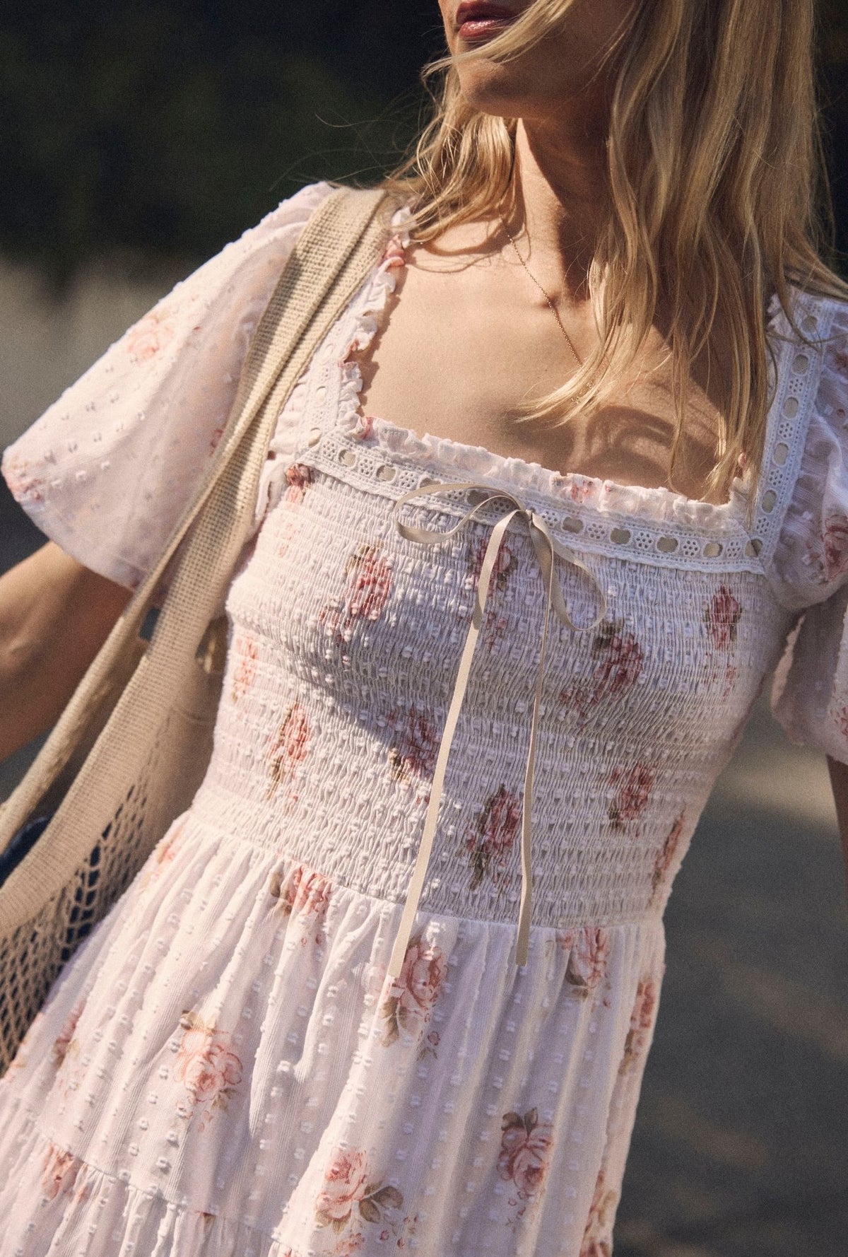 A lady wearing The "Rosalie" Venice Rose Cotton Swiss Dot Maxi Dress closer view at front top