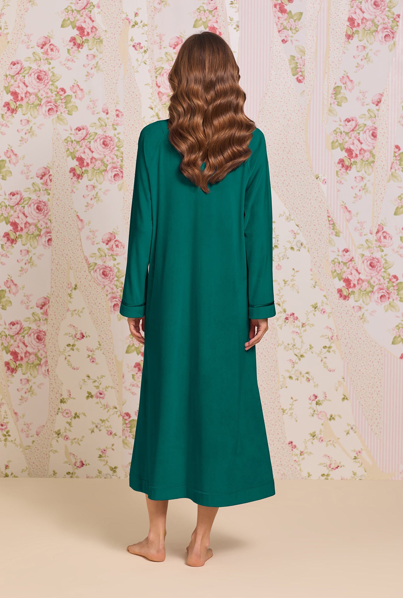 A lady wearing Lux Velour Long Zip Robe