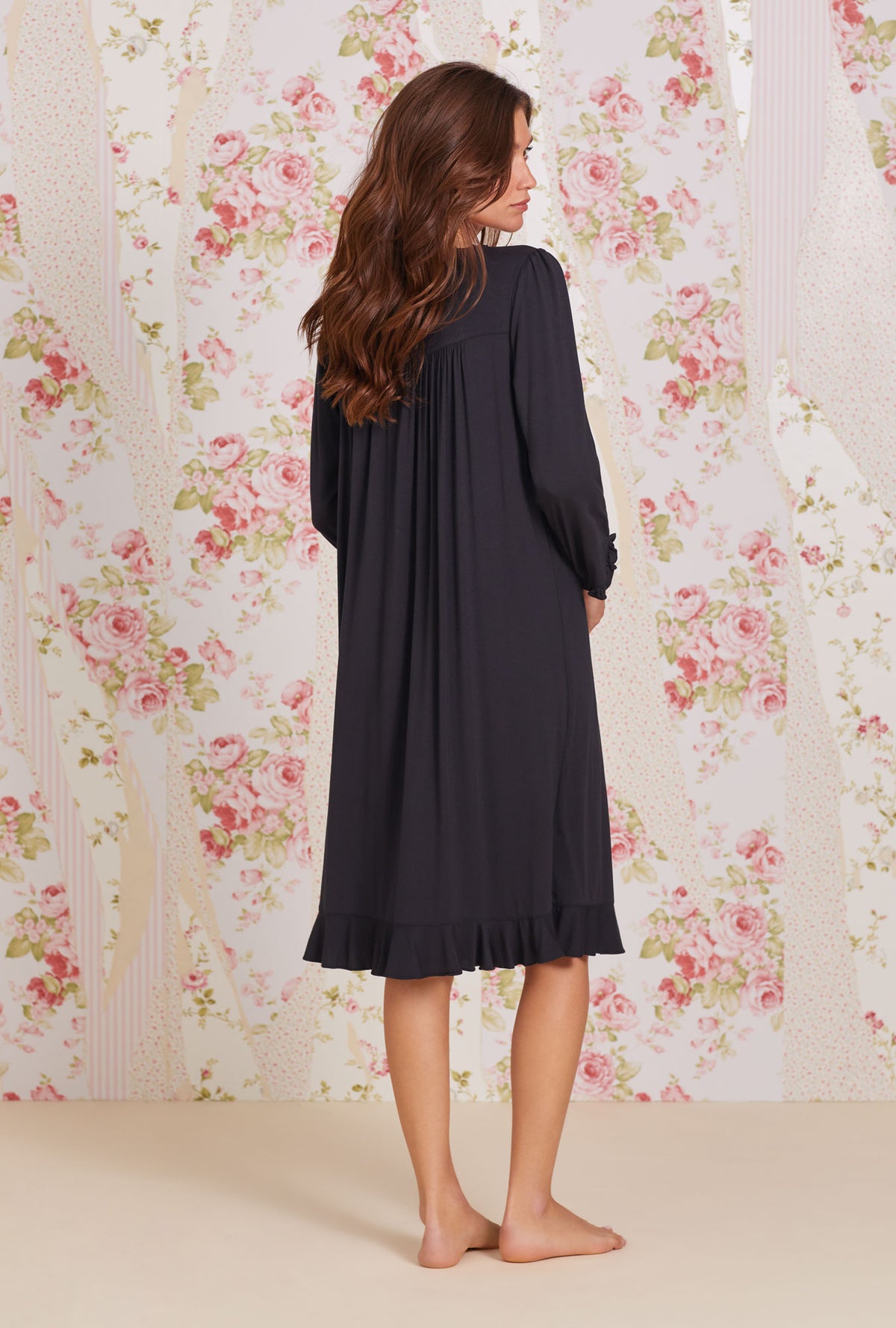A lady wearing Iconic Black Tencel™ Modal Long Sleeve Waltz Nightgown