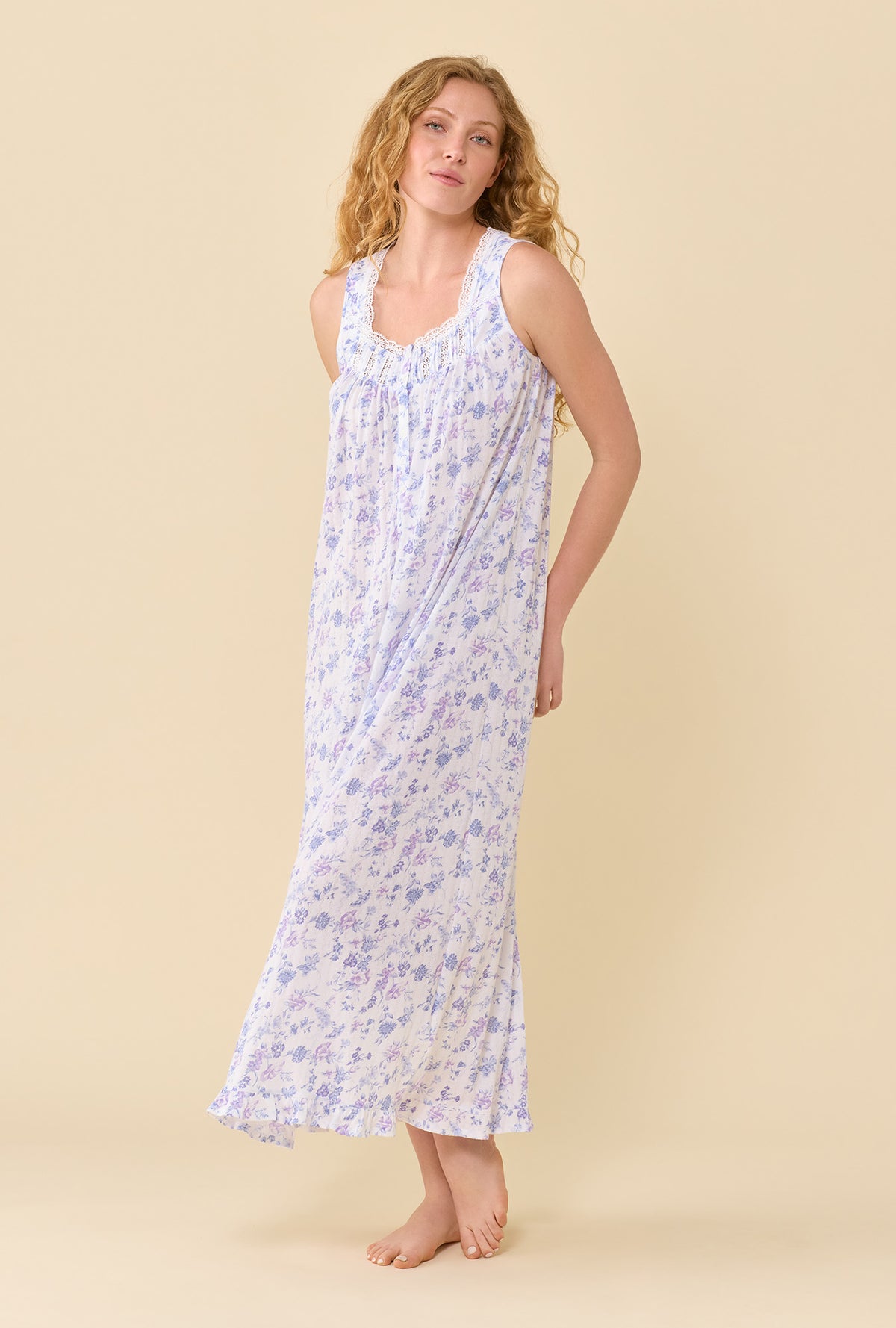 A Lady Wearing The Eileen Wildflower Meadow Nightgown in a side angled pose