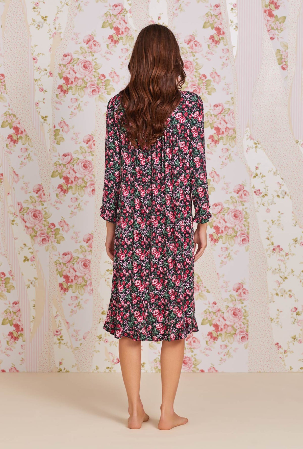 A lady wearing red Long Sleeve Waltz Nightgown with Brilliant Rose print