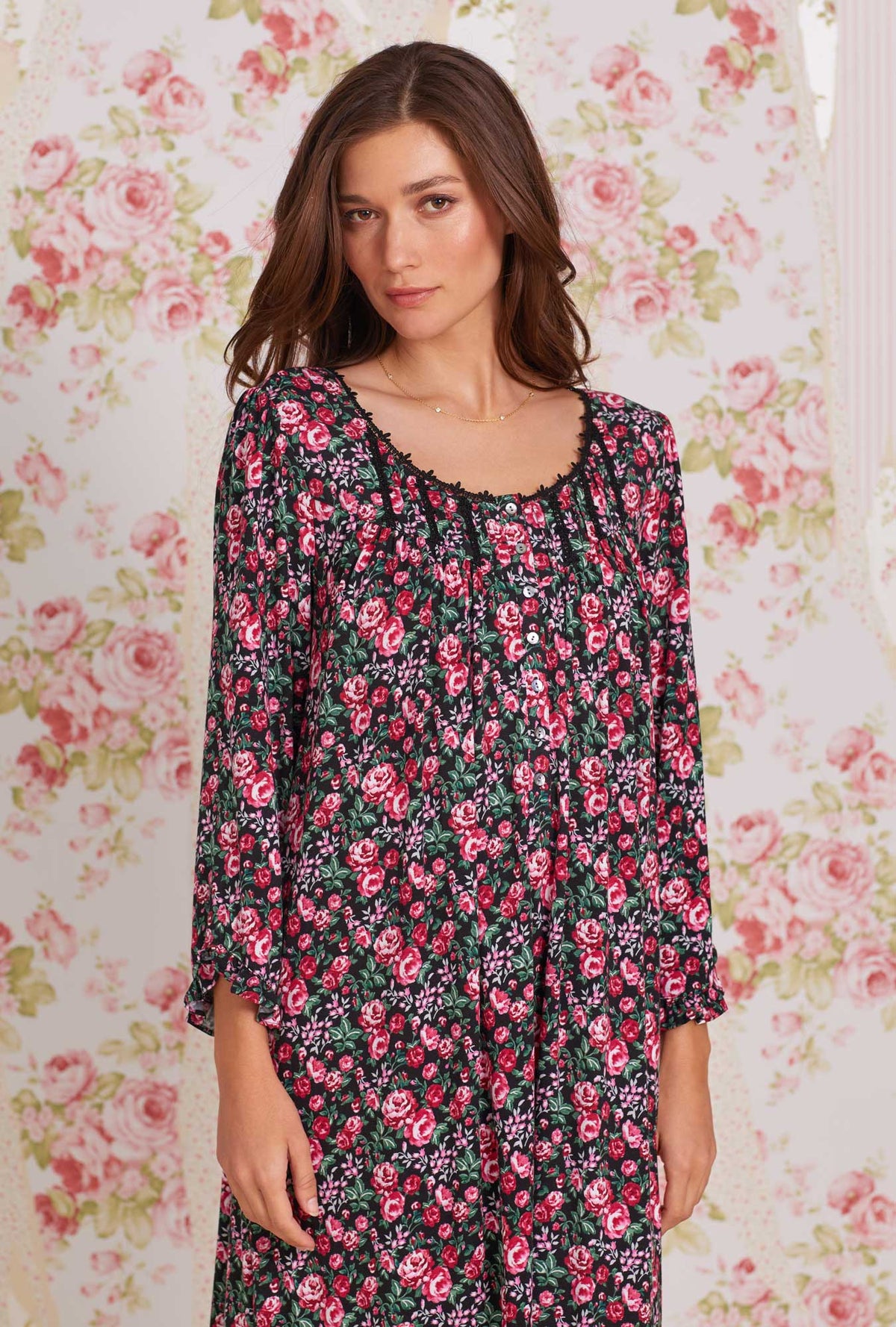 A lady wearing red Long Sleeve Waltz Nightgown with Brilliant Rose print