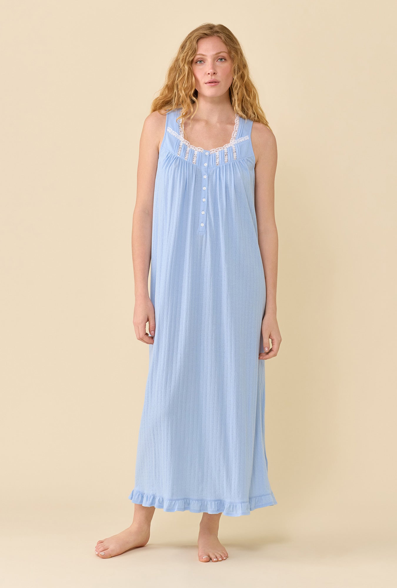 A Lady Wearing The Eileen Periwinkle Nightgown in a still pose