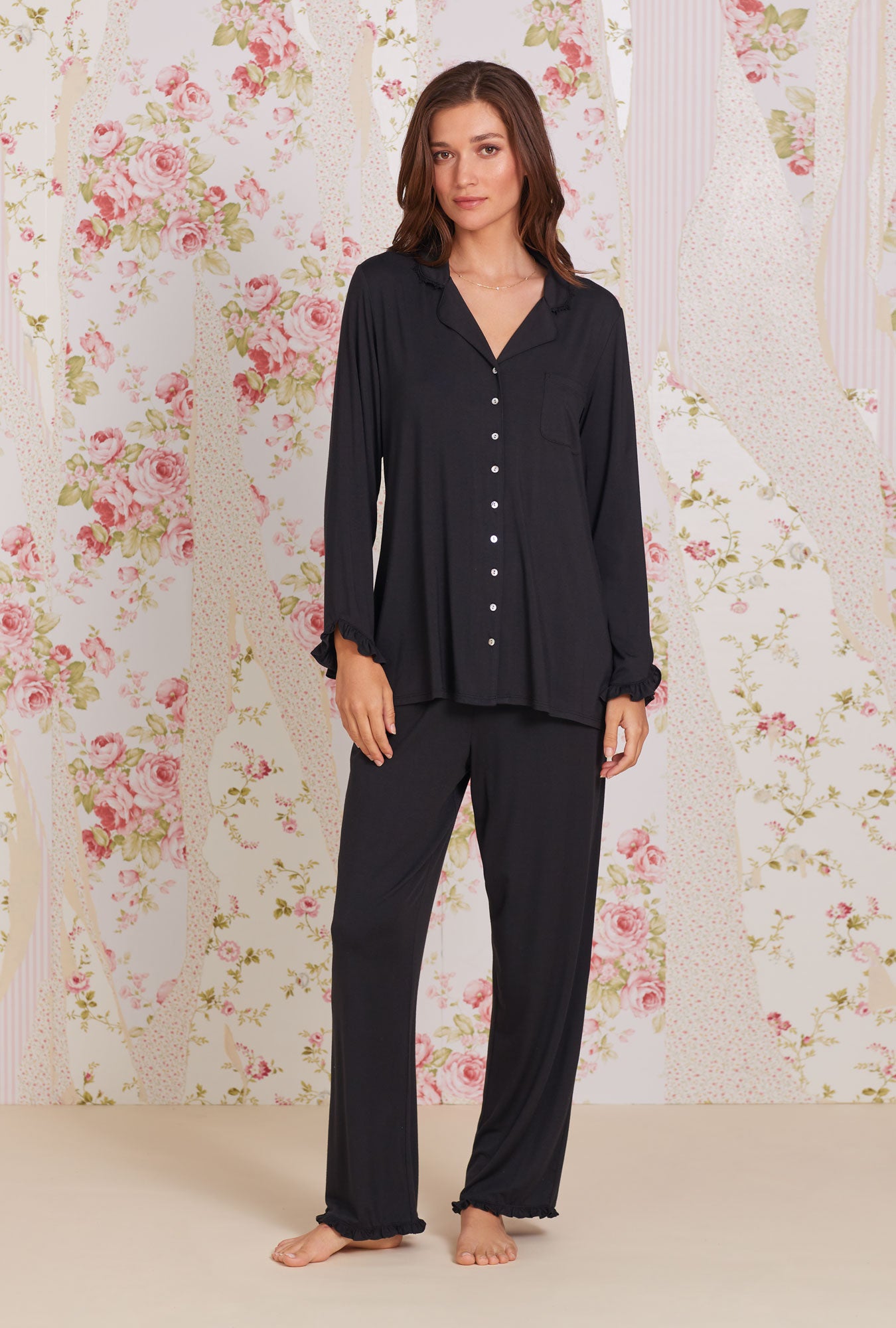 A lady wearing black long sleeve tencel modal classic notch pajama.