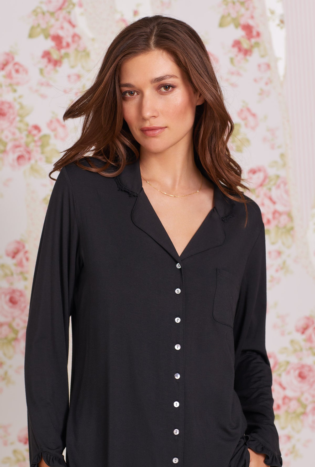 A lady wearing black long sleeve tencel modal classic notch pajama.