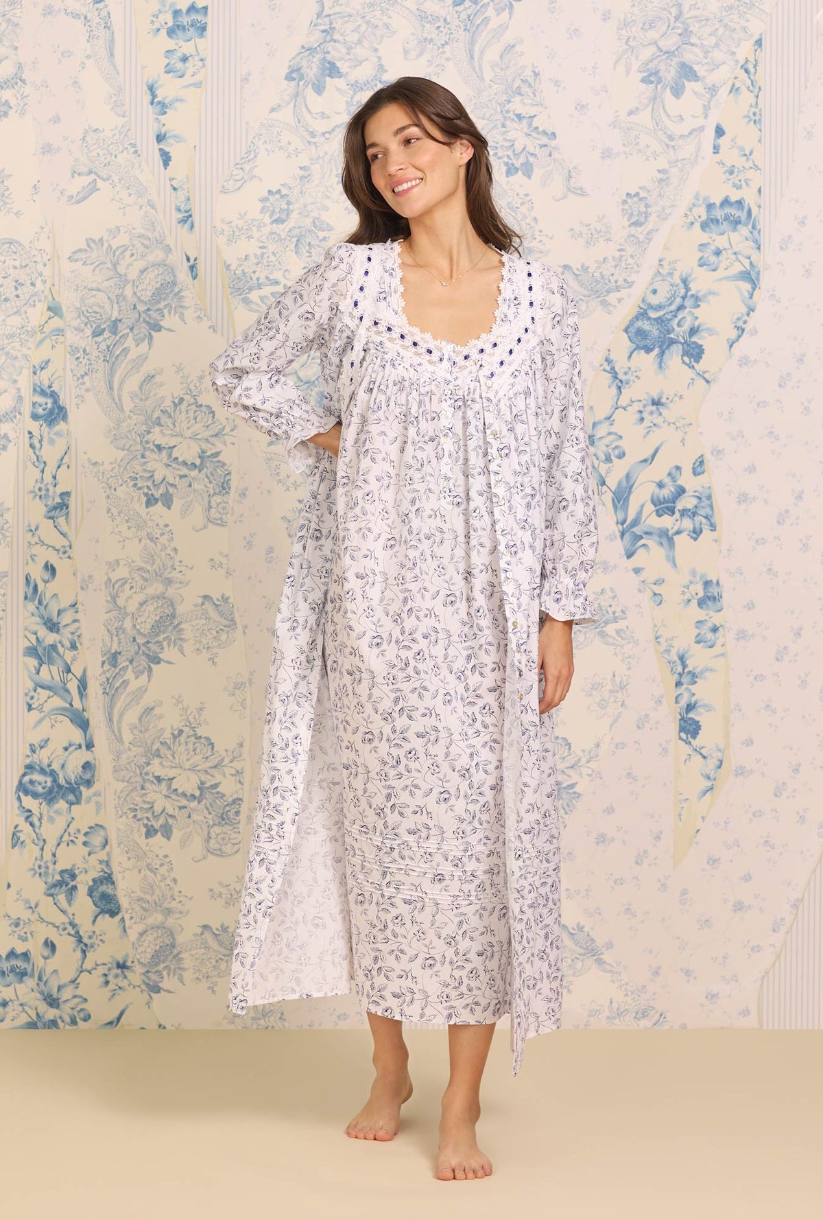 A lady wearing white sleeveless &quot;Eileen&quot; Cotton Nightgown with Marine Rose Floral print