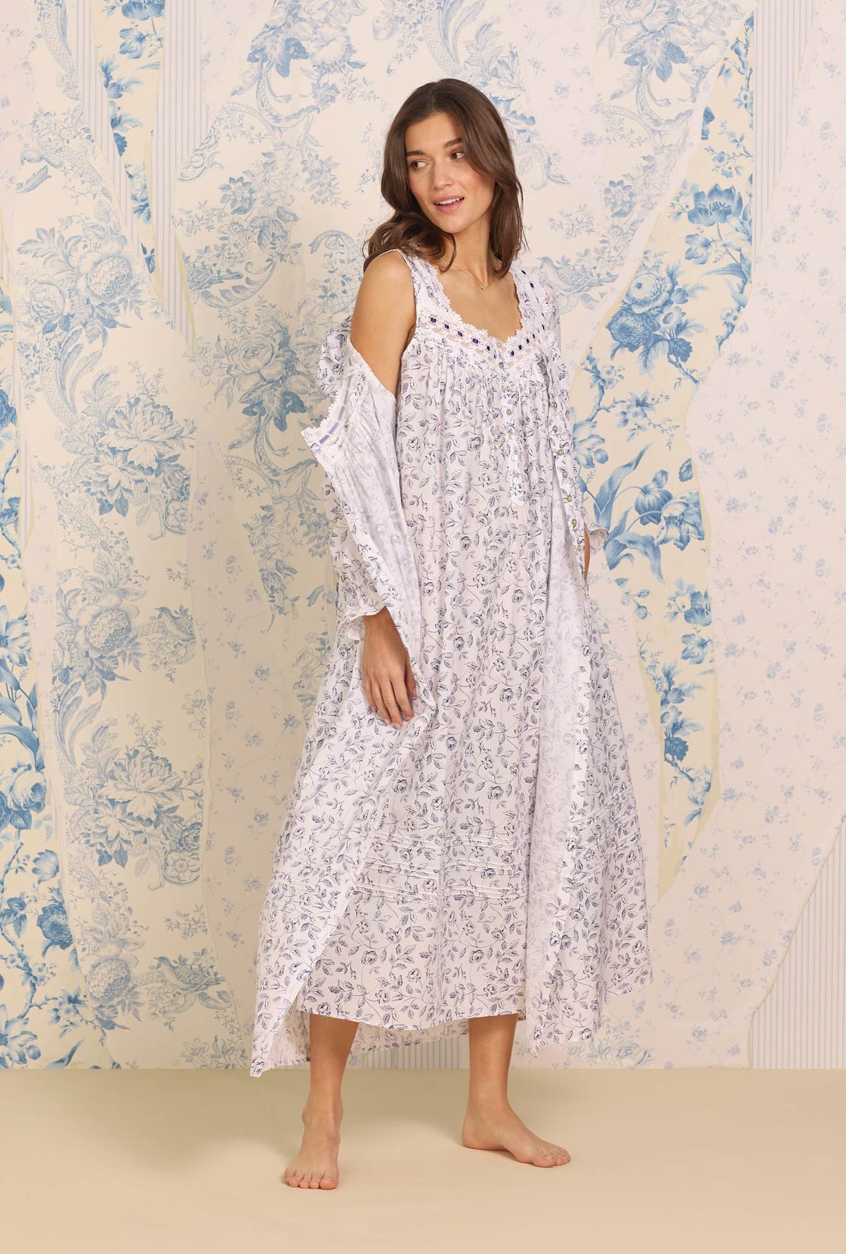 A lady wearing white long sleeve Button Front Cotton Robe with Marine Floral print