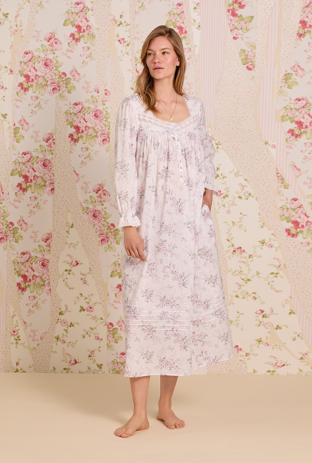 A lady wearing Quiet Bloom Cotton Lawn Long Sleeve Ballet Nightgown