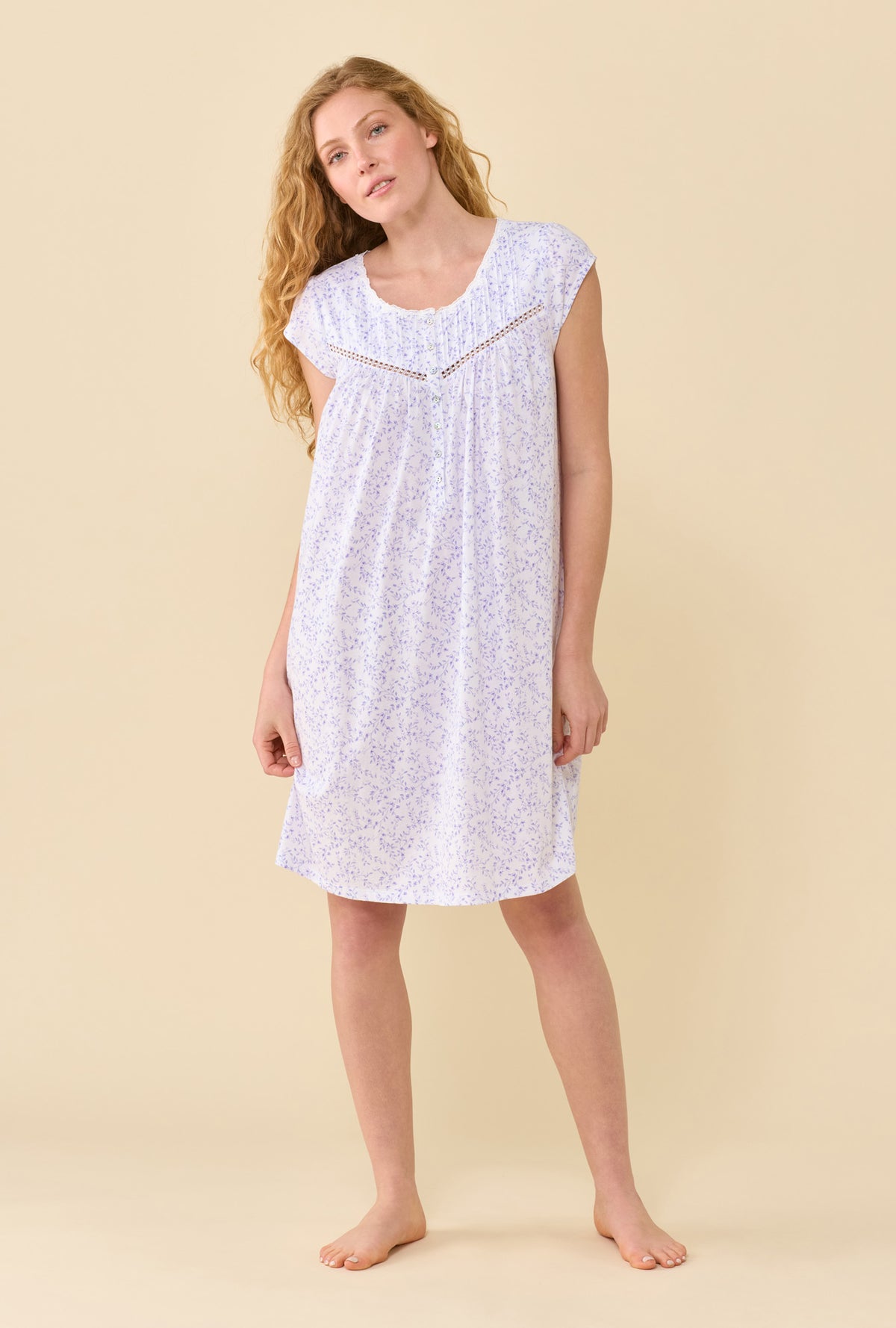 A Lady Wearing Peri Vines Chemise in a front facing free hand pose