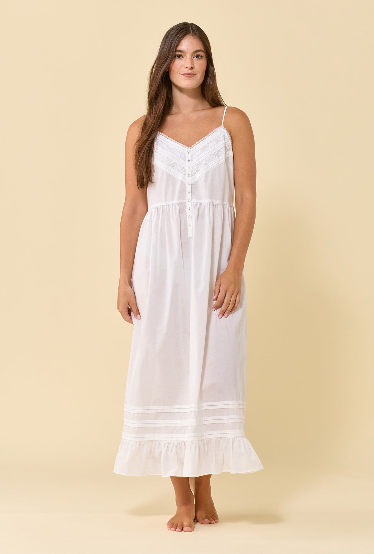 A lady wearing Elise Soft White 100% Cotton Woven Lawn Shoulder Strap Ballet Nightgown