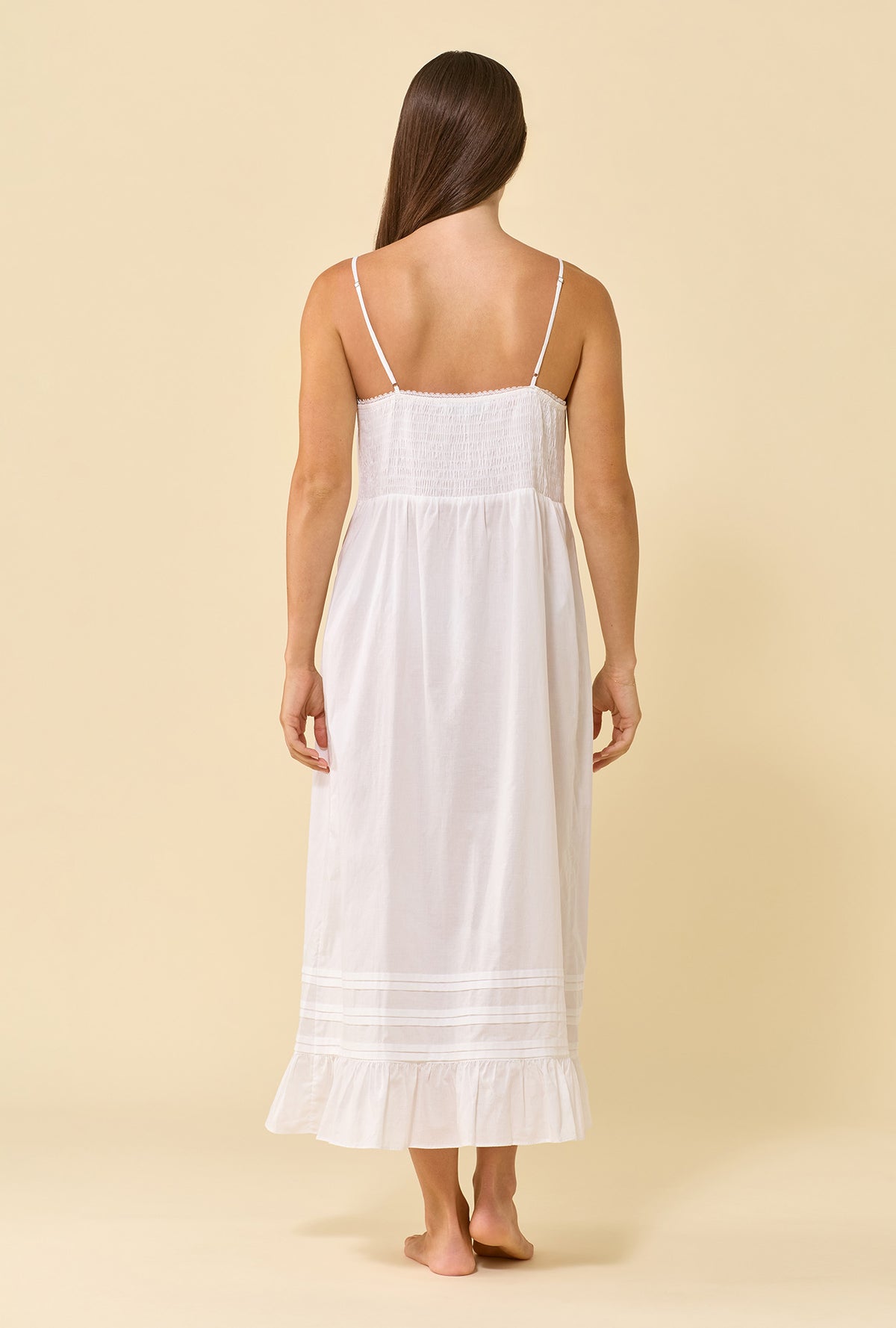 A lady wearing Elise Soft White 100% Cotton Woven Lawn Shoulder Strap Ballet Nightgown