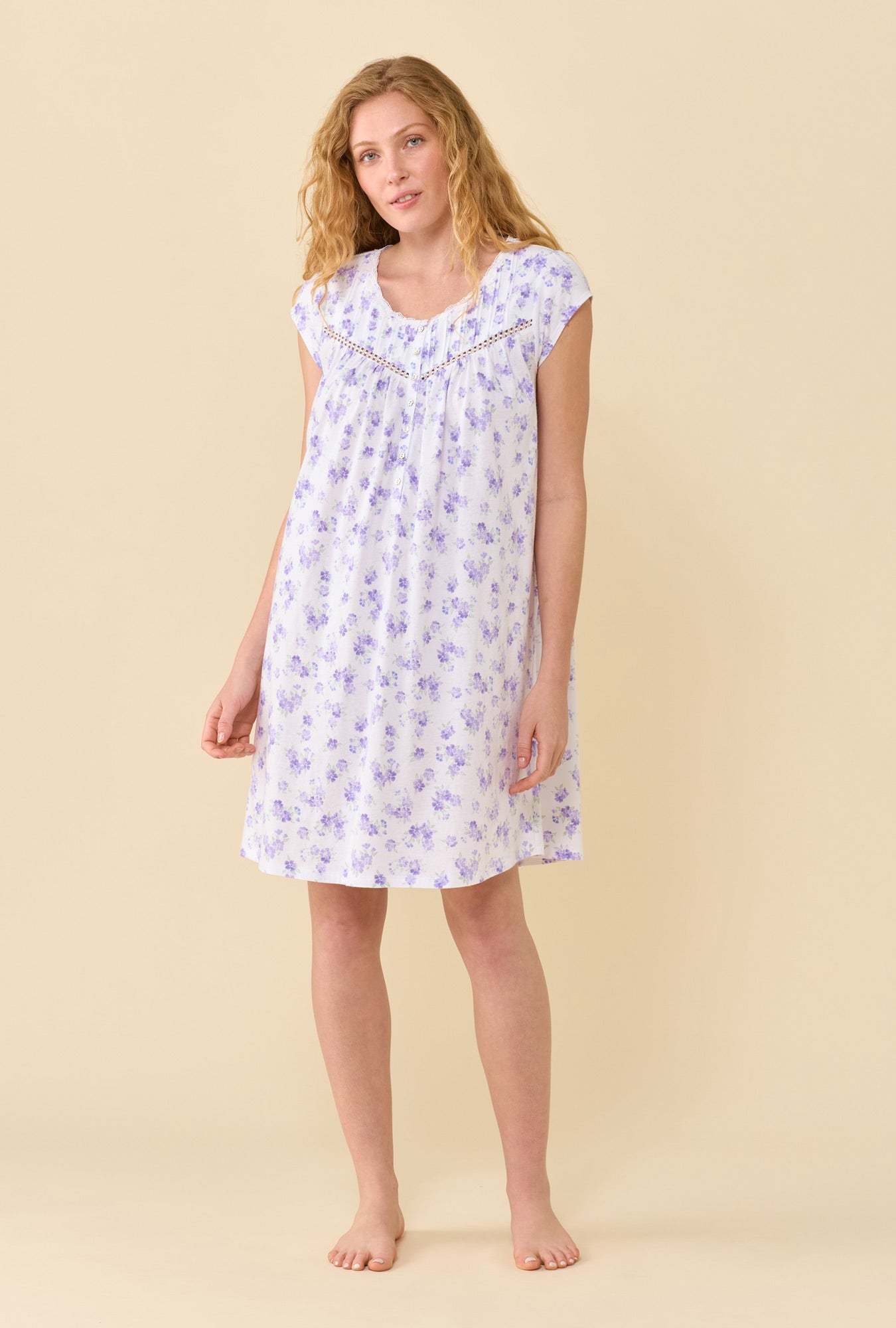 A Lady Wearing Garden Blossom Chemise in a front facing free hand pose