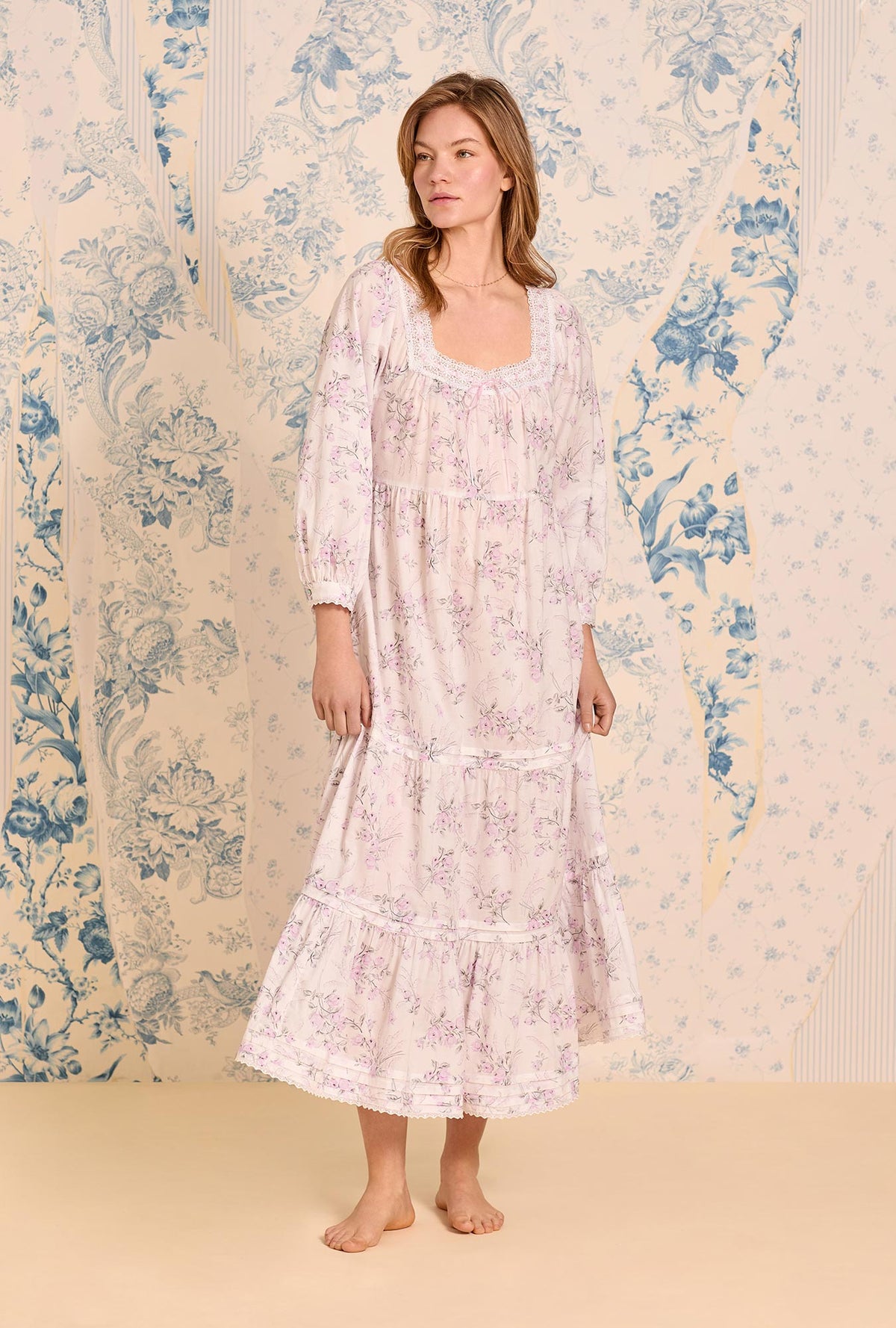 A lady wearing The &quot;Odette&quot; Iconic White Cotton Lawn Ballet Nightgown