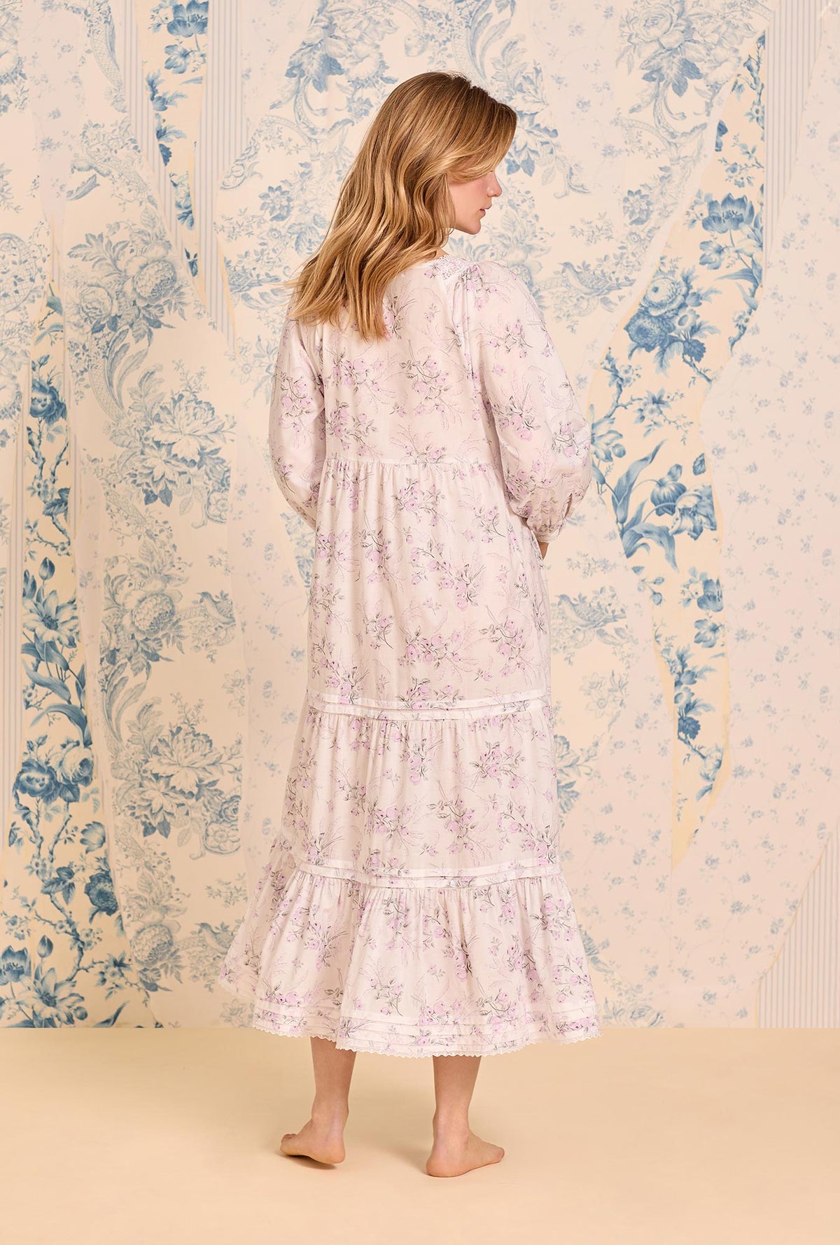 A lady wearing The &quot;Odette&quot; Iconic White Cotton Lawn Ballet Nightgown