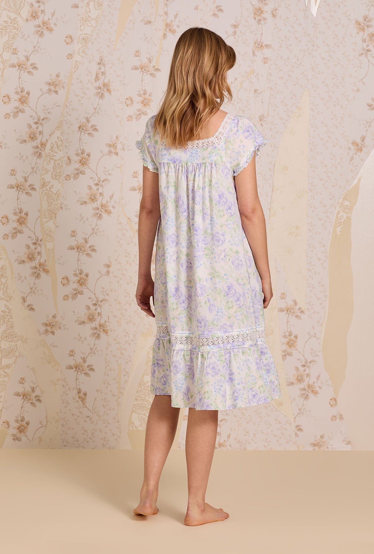 A lady wearing Lavender Echo Cotton Lawn Waltz Nightgown