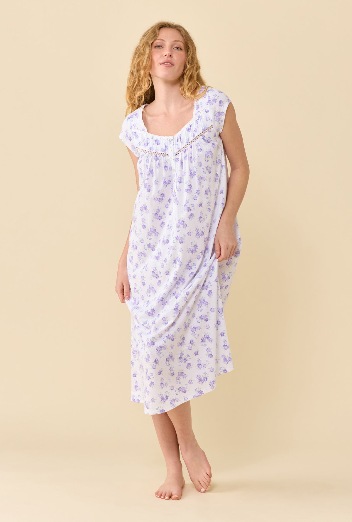 A Lady Wearing Garden Blossom Nightgown in a front facing pose