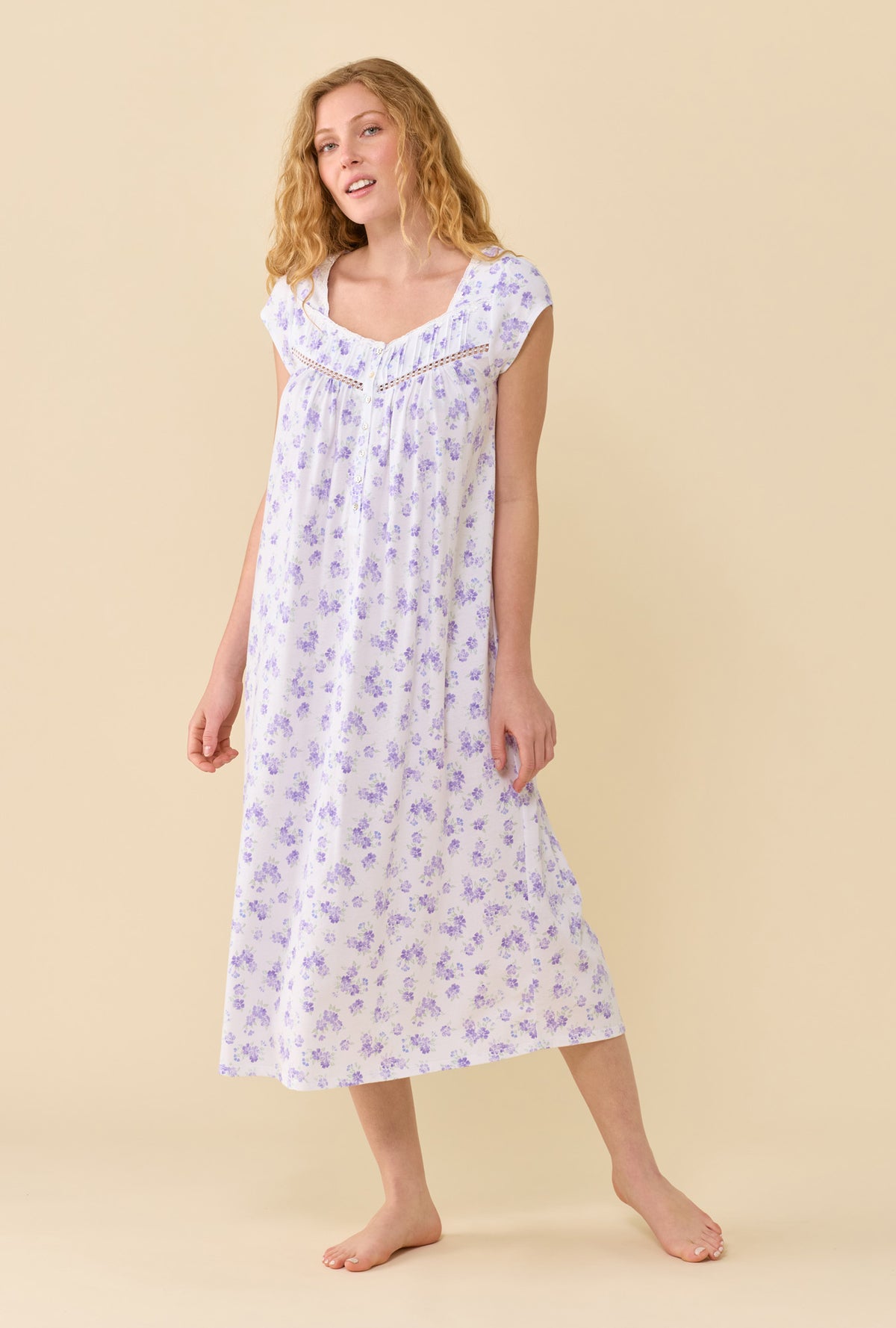 A Lady Wearing Garden Blossom Nightgown in a front facing free hand pose