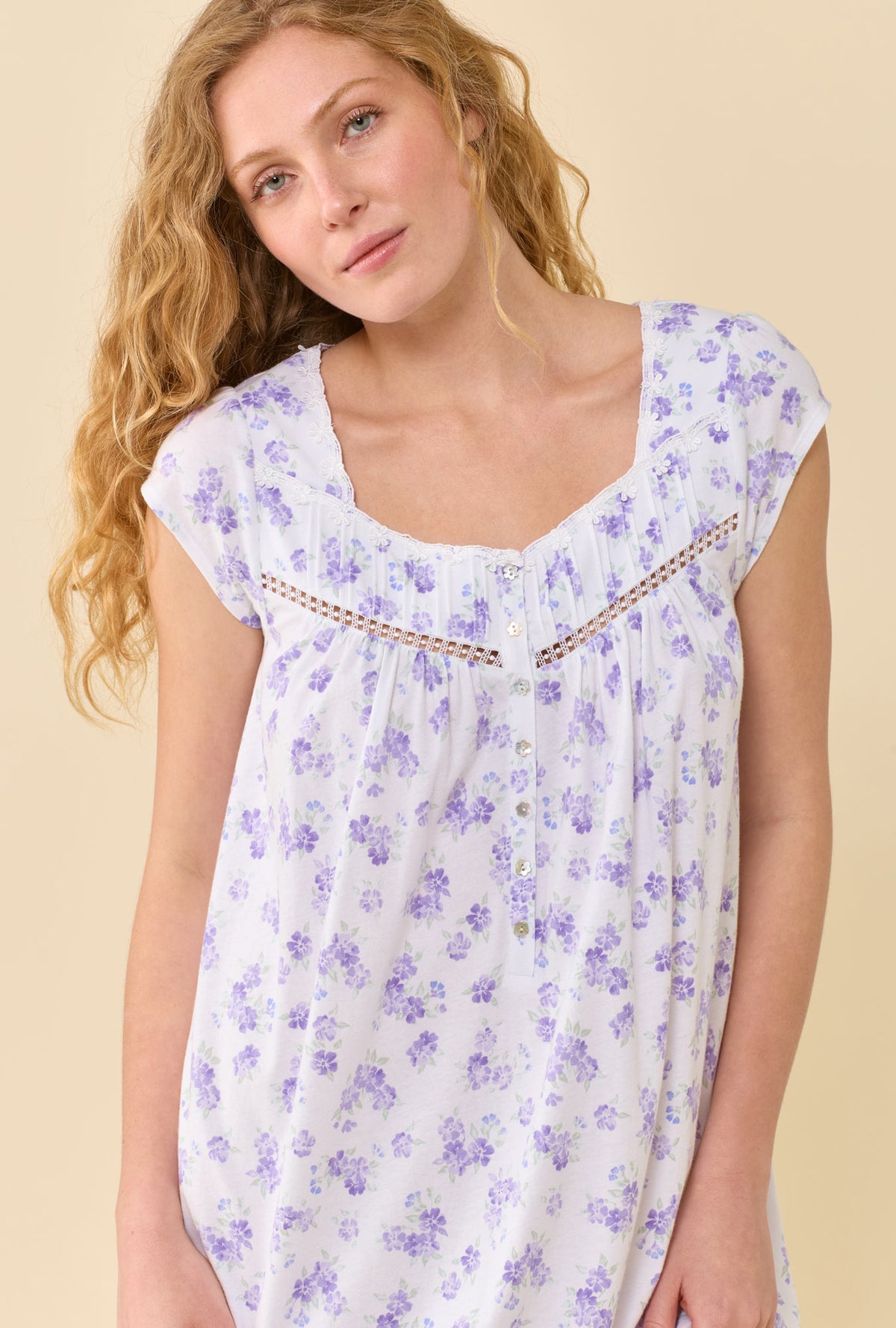 A Lady Wearing Garden Blossom Nightgown in a front facing close up view pose