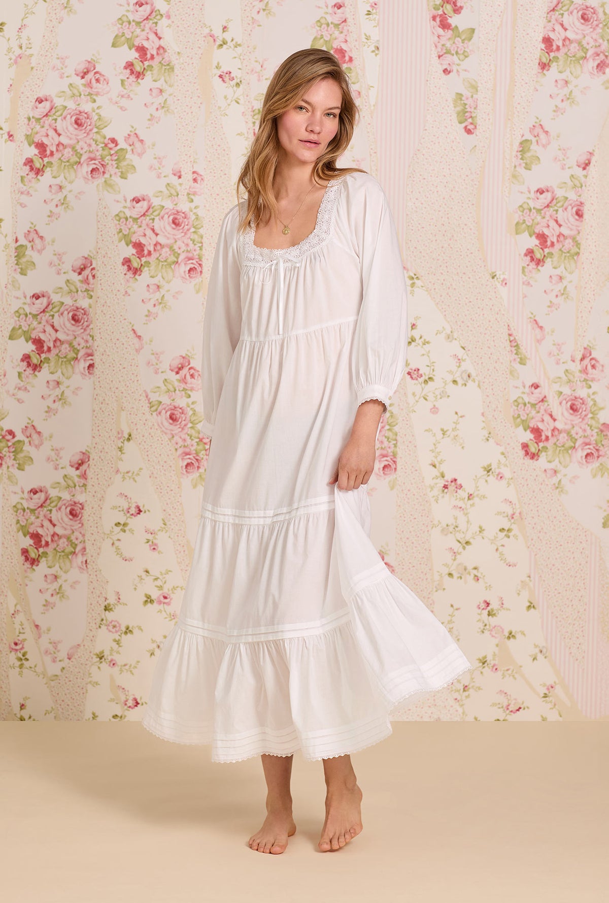A lady wearing The &quot;Odette&quot; Iconic White Cotton Lawn Ballet Nightgown