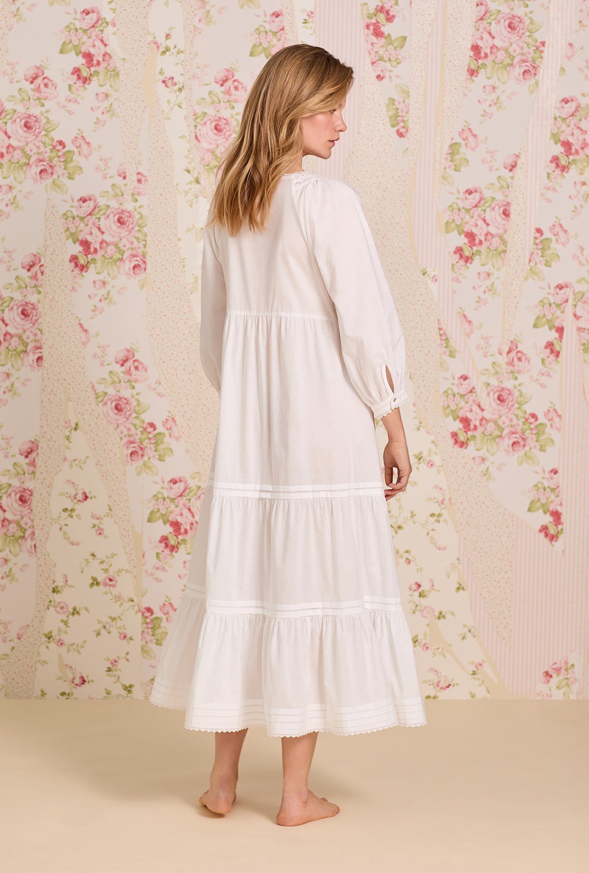 A lady wearing The &quot;Odette&quot; Iconic White Cotton Lawn Ballet Nightgown