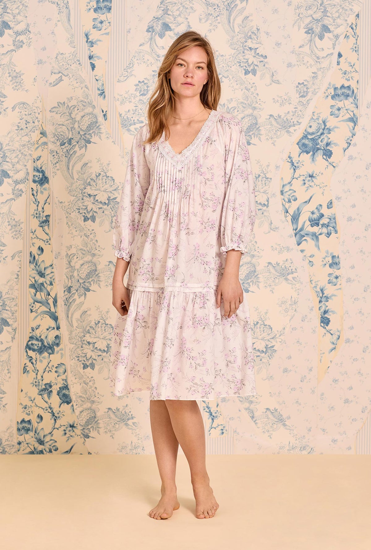 A lady wearing The &quot;Marielle&quot; Quiet Bloom Cotton Lawn Waltz Nightgown