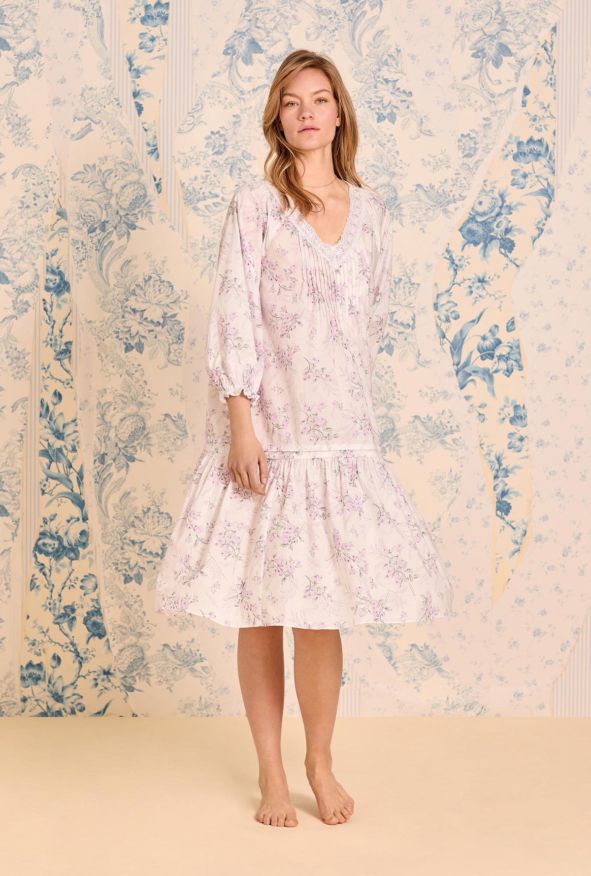 A lady wearing The &quot;Marielle&quot; Quiet Bloom Cotton Lawn Waltz Nightgown