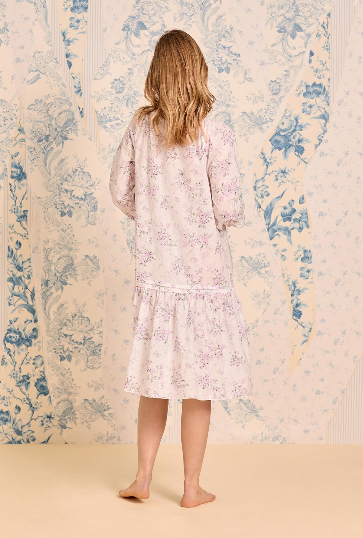 A lady wearing The &quot;Marielle&quot; Quiet Bloom Cotton Lawn Waltz Nightgown