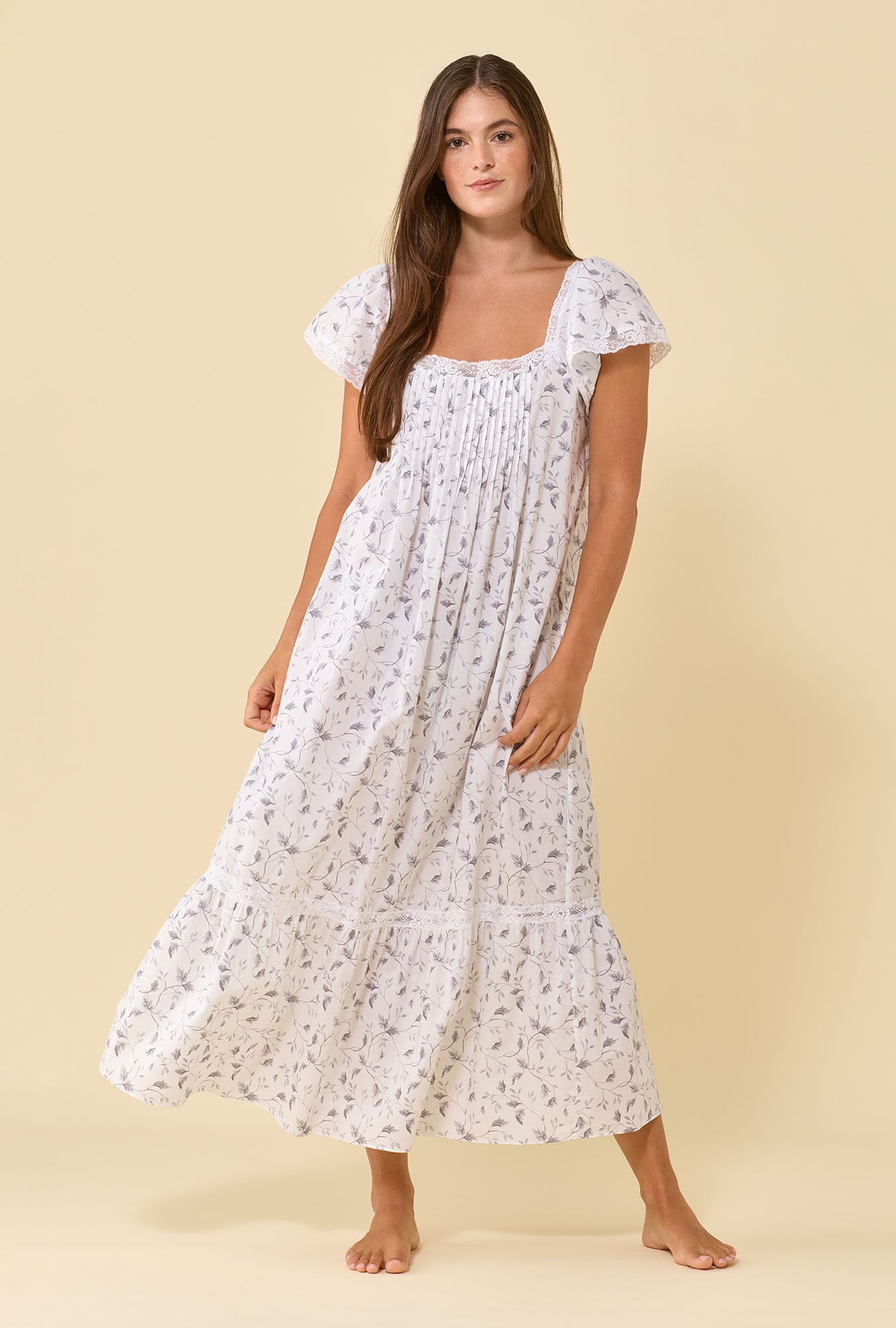 A lady wearing Grace Silver Willow 100% Cotton Woven Lawn Flutter Sleeve Ballet Nightgown