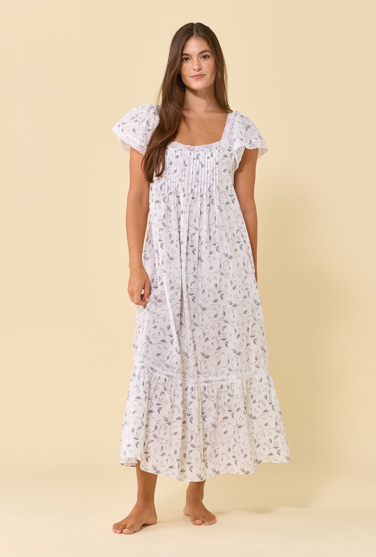 A lady wearing Grace Silver Willow 100% Cotton Woven Lawn Flutter Sleeve Ballet Nightgown looking front
