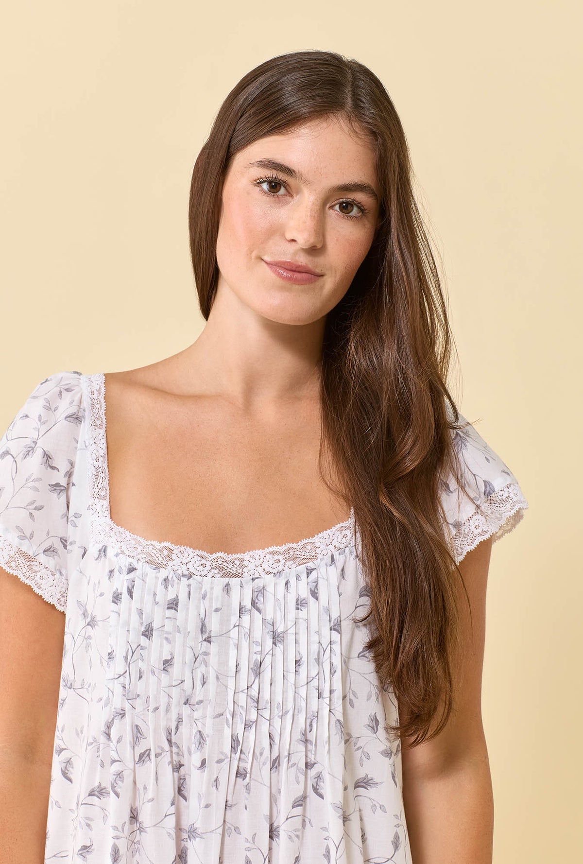 A lady wearing Grace Silver Willow 100% Cotton Woven Lawn Flutter Sleeve Ballet Nightgown closer look