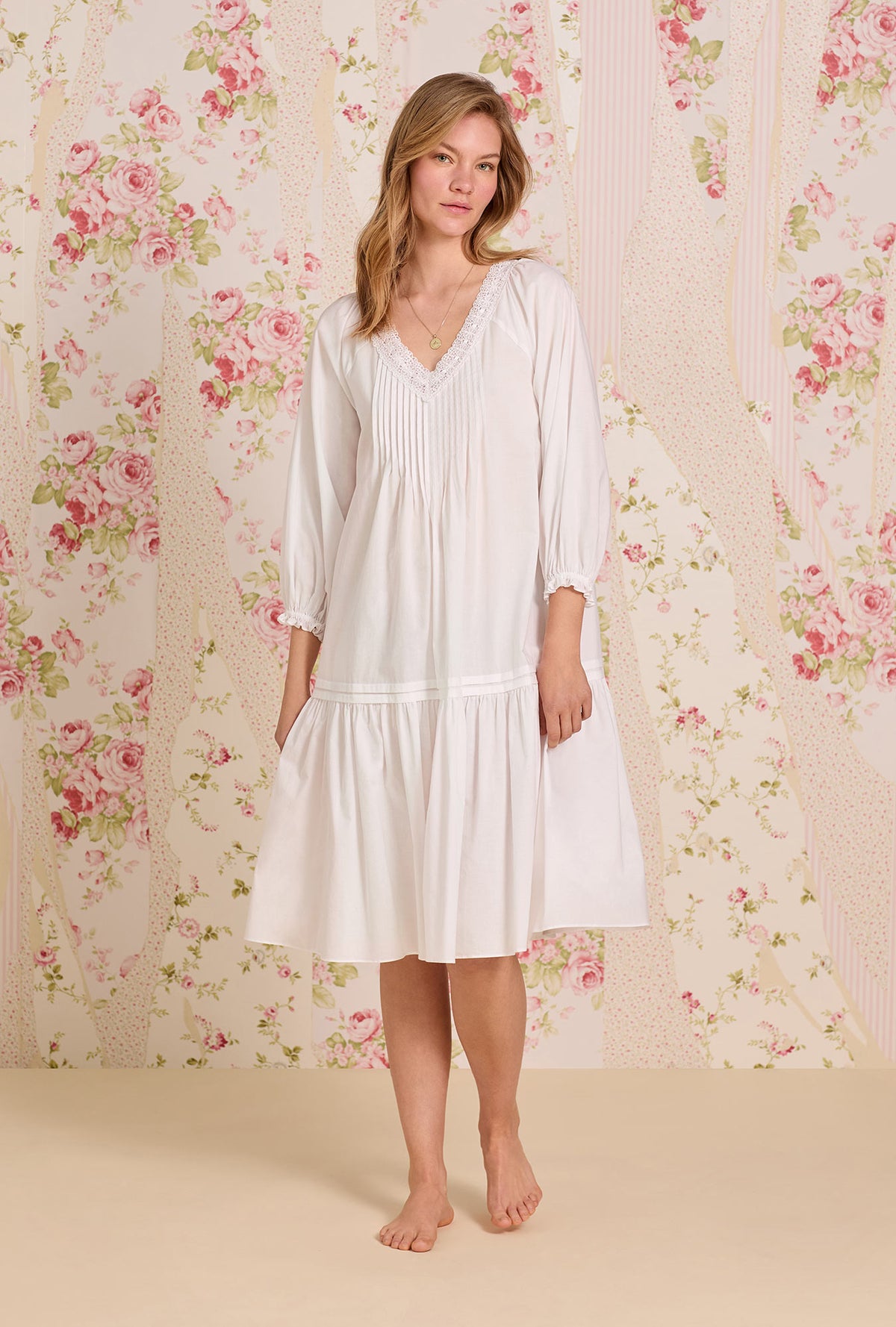 A lady wearing The &quot;Marielle&quot; Iconic White Cotton Lawn Waltz Nightgown