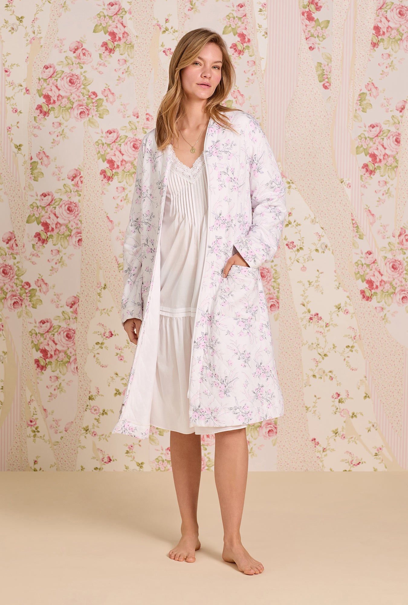 A lady wearing Quiet Bloom Cotton Diamond Quilt Zip Robe