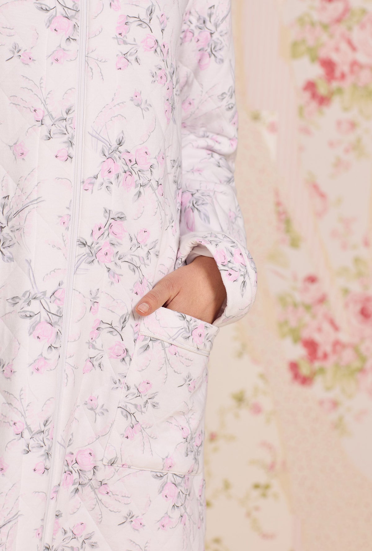 A lady wearing Quiet Bloom Cotton Diamond Quilt Zip Robe