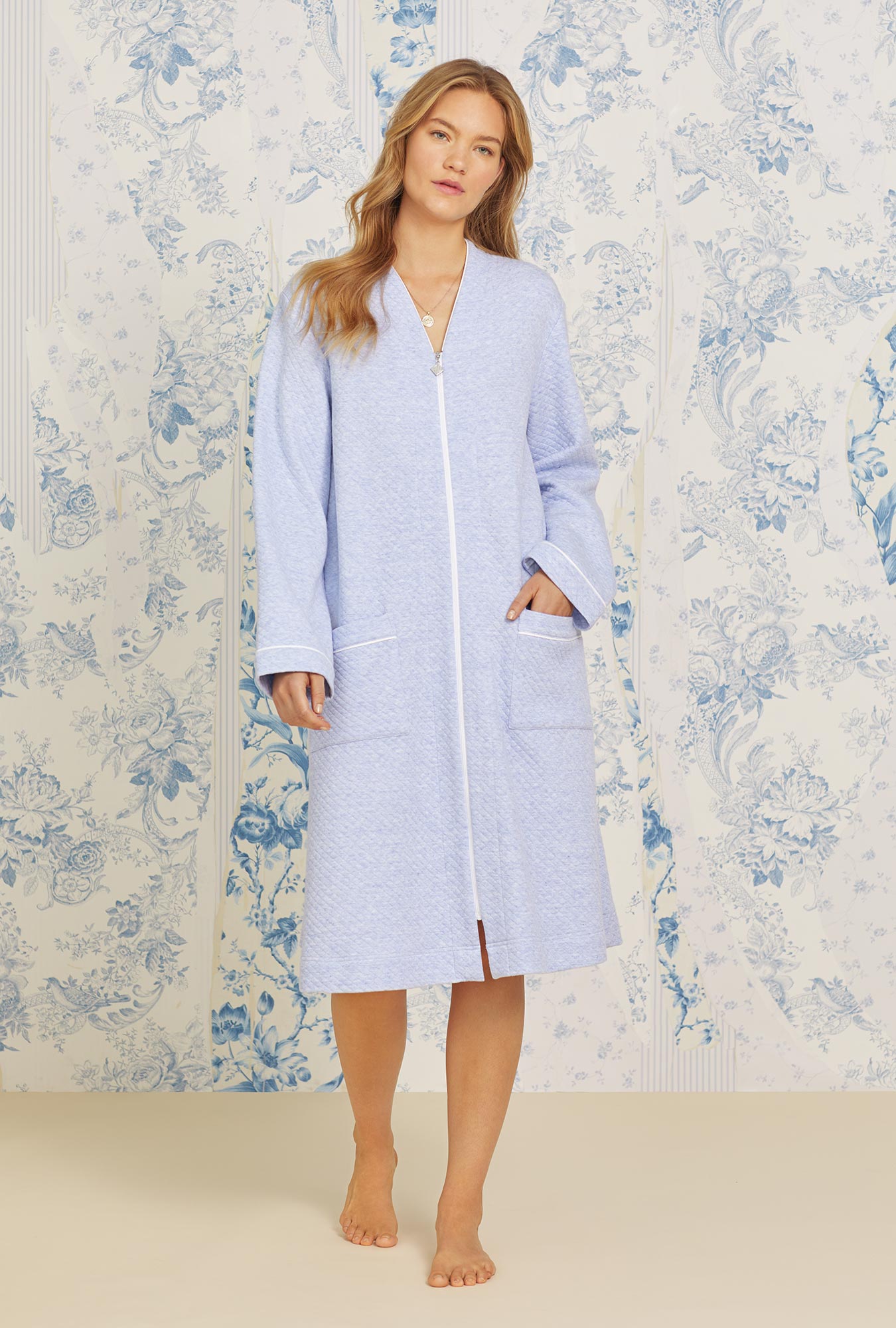 A lady wearing Classic Peri Heather Diamond Jaquard Zip Robe