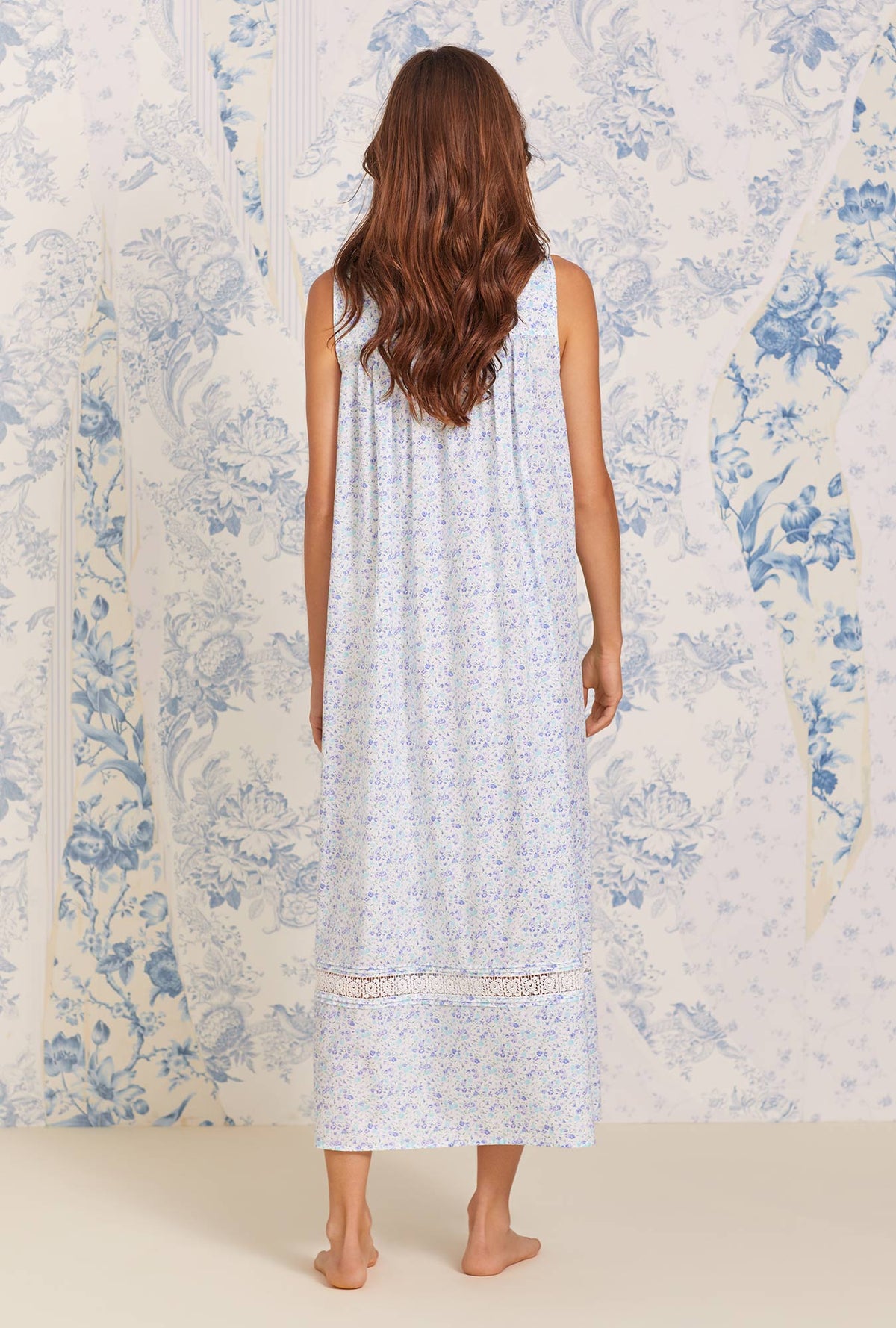 A lady wearing blue sleeveless Nightgown with Sweet Ditsy Dream print