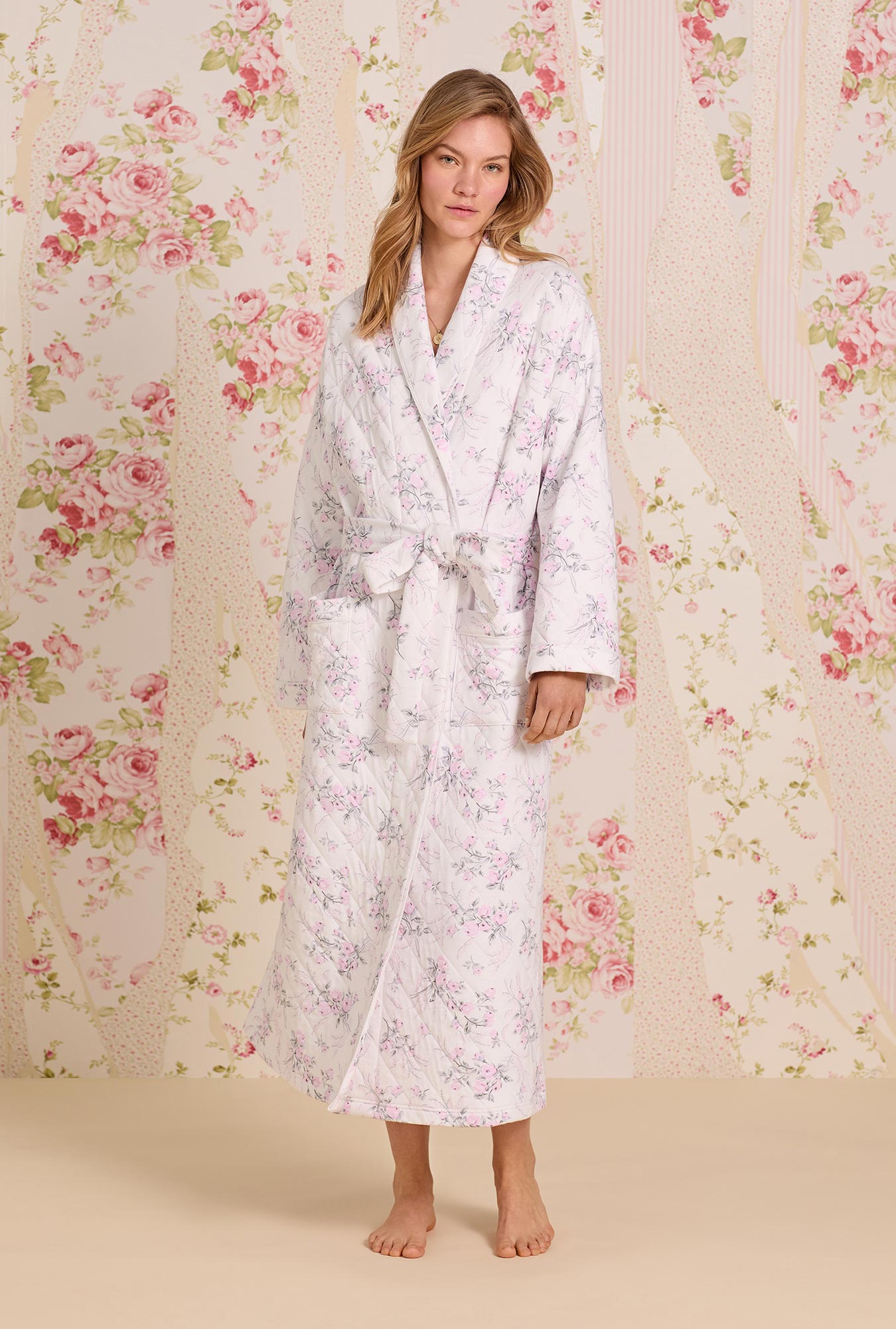 A lady wearing Quiet Bloom Cotton Diamond Quilt Wrap Robe