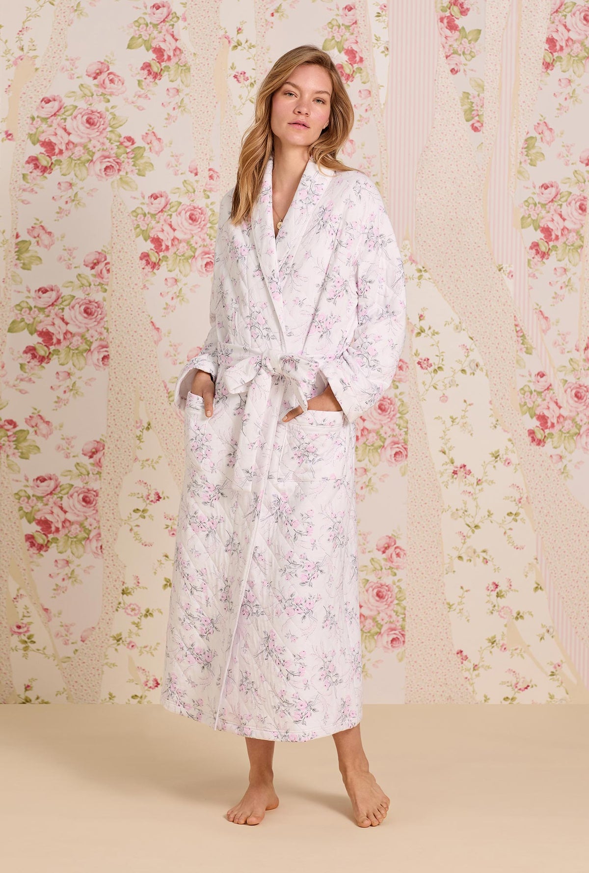 A lady wearing Quiet Bloom Cotton Diamond Quilt Wrap Robe