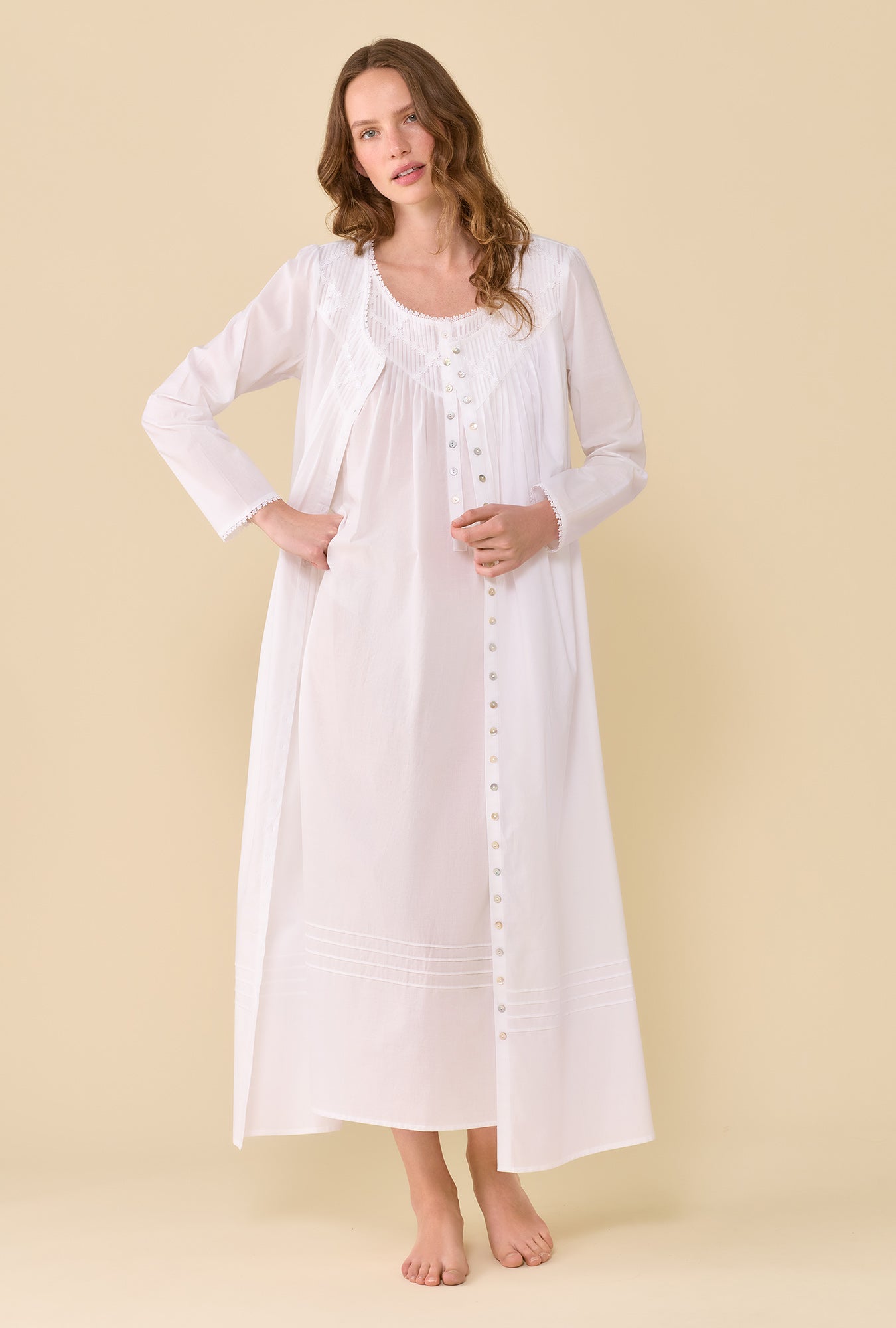 A lady wearing Iconic White Poetic Long Sleeve Robe 