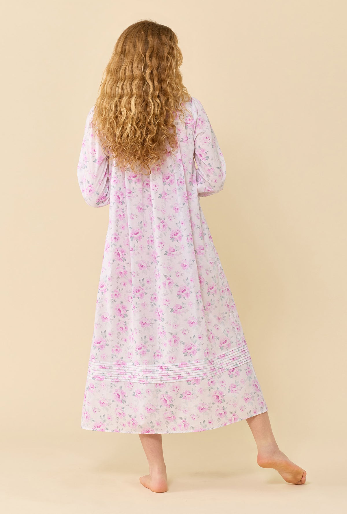 A lady wearing Antique Rose 100% Cotton Woven Lawn Long Sleeve Ballet Nightgown back view