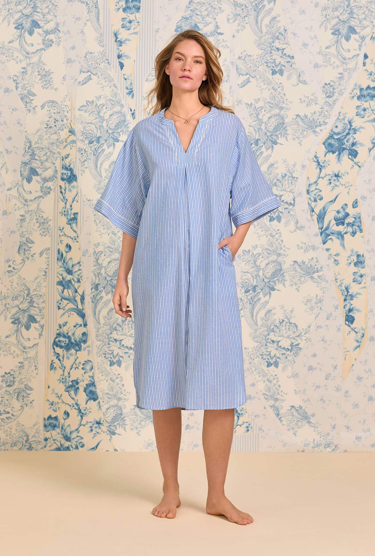 A lady wearing The &quot;Lana&quot; Classic Cotton Stripe Caftan